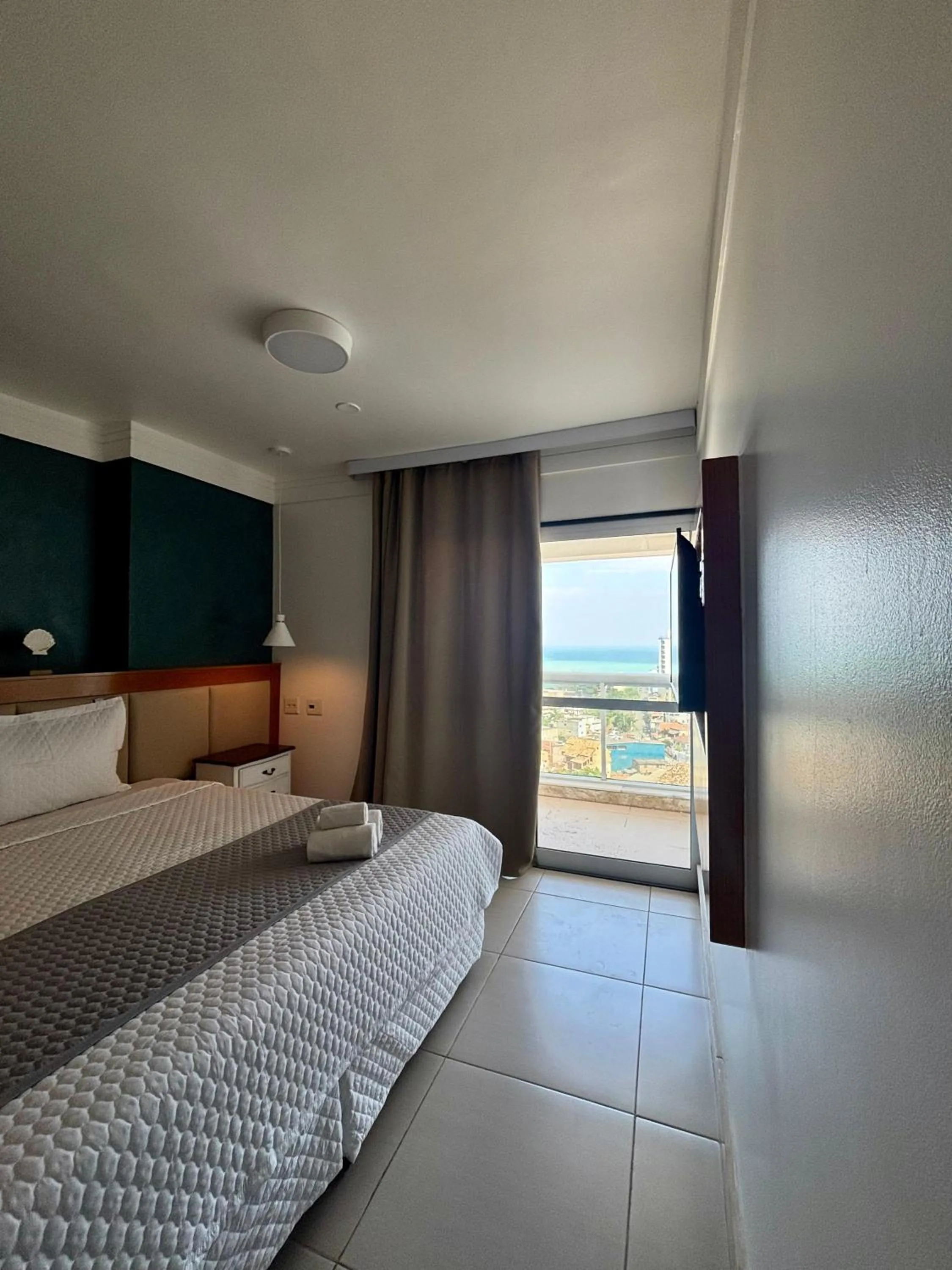 Bed in Royal Urban Macaé Hotel