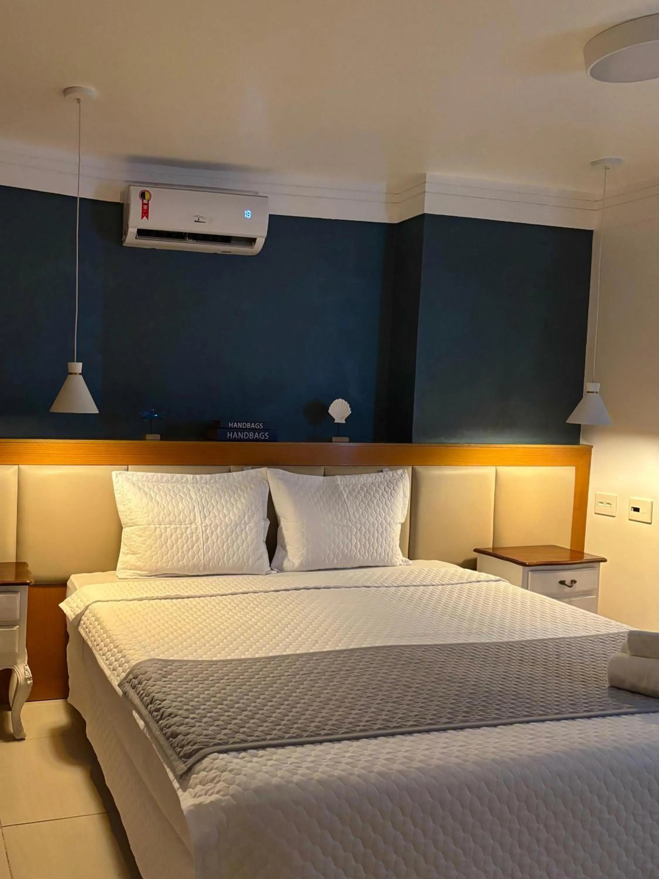 Bed in Royal Urban Macaé Hotel