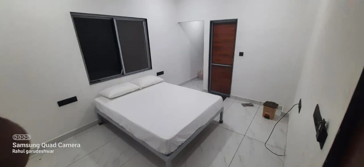 Bedroom, Bed in Gurukrupa Yatri Niwas