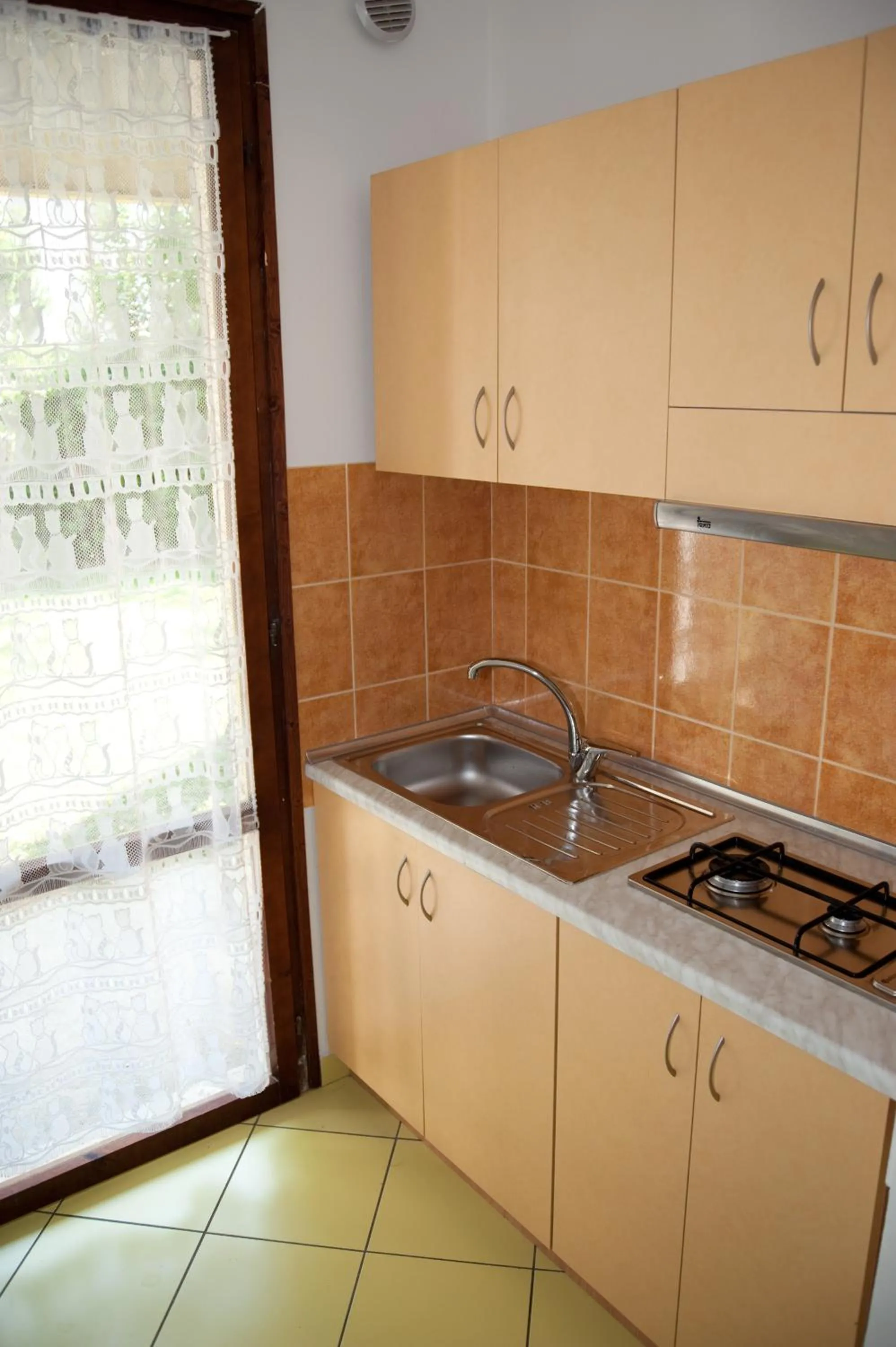 Kitchen or kitchenette in Residence Blu Marlin Natural free beach