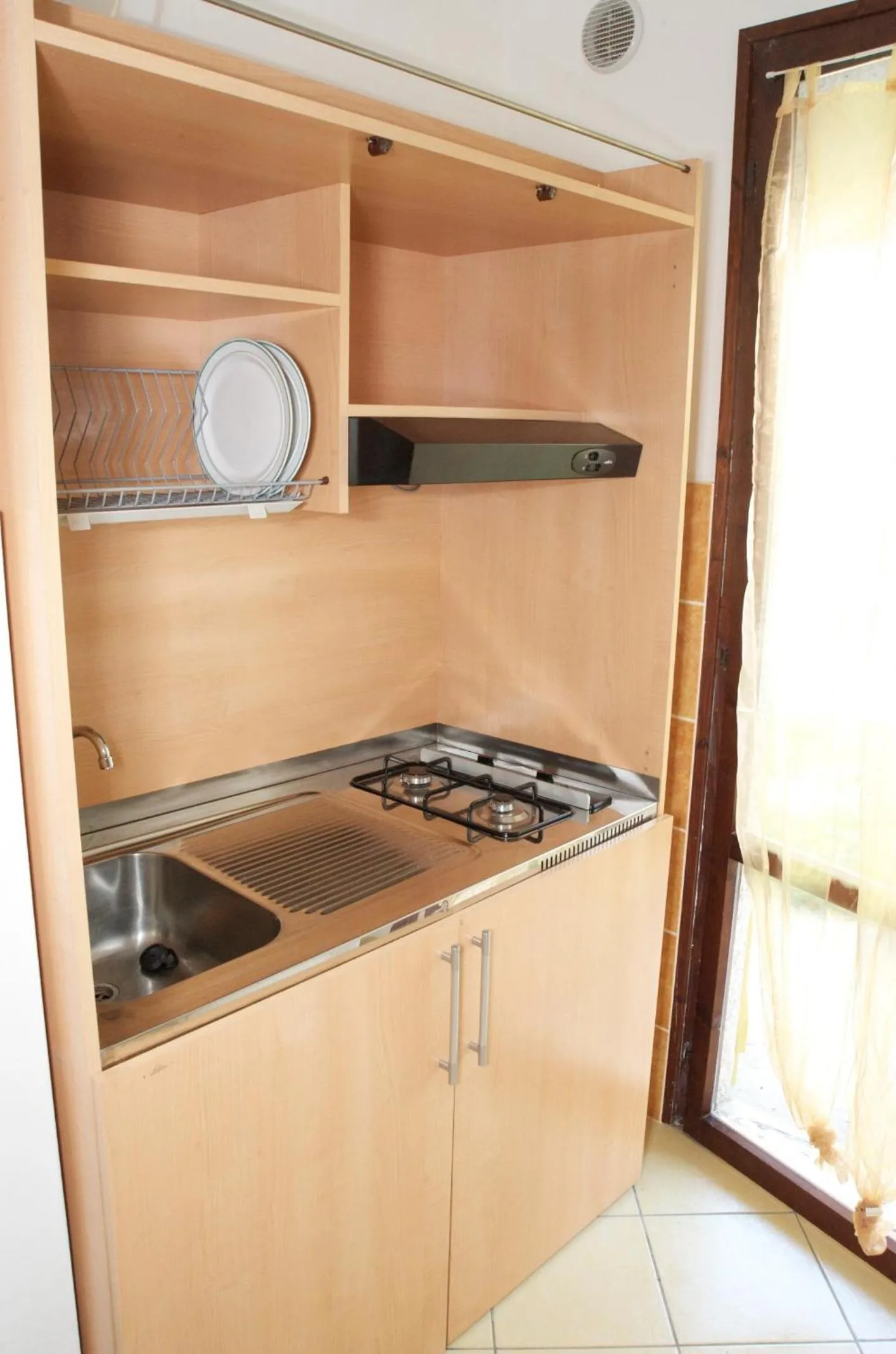 Kitchen or kitchenette in Residence Blu Marlin Natural free beach