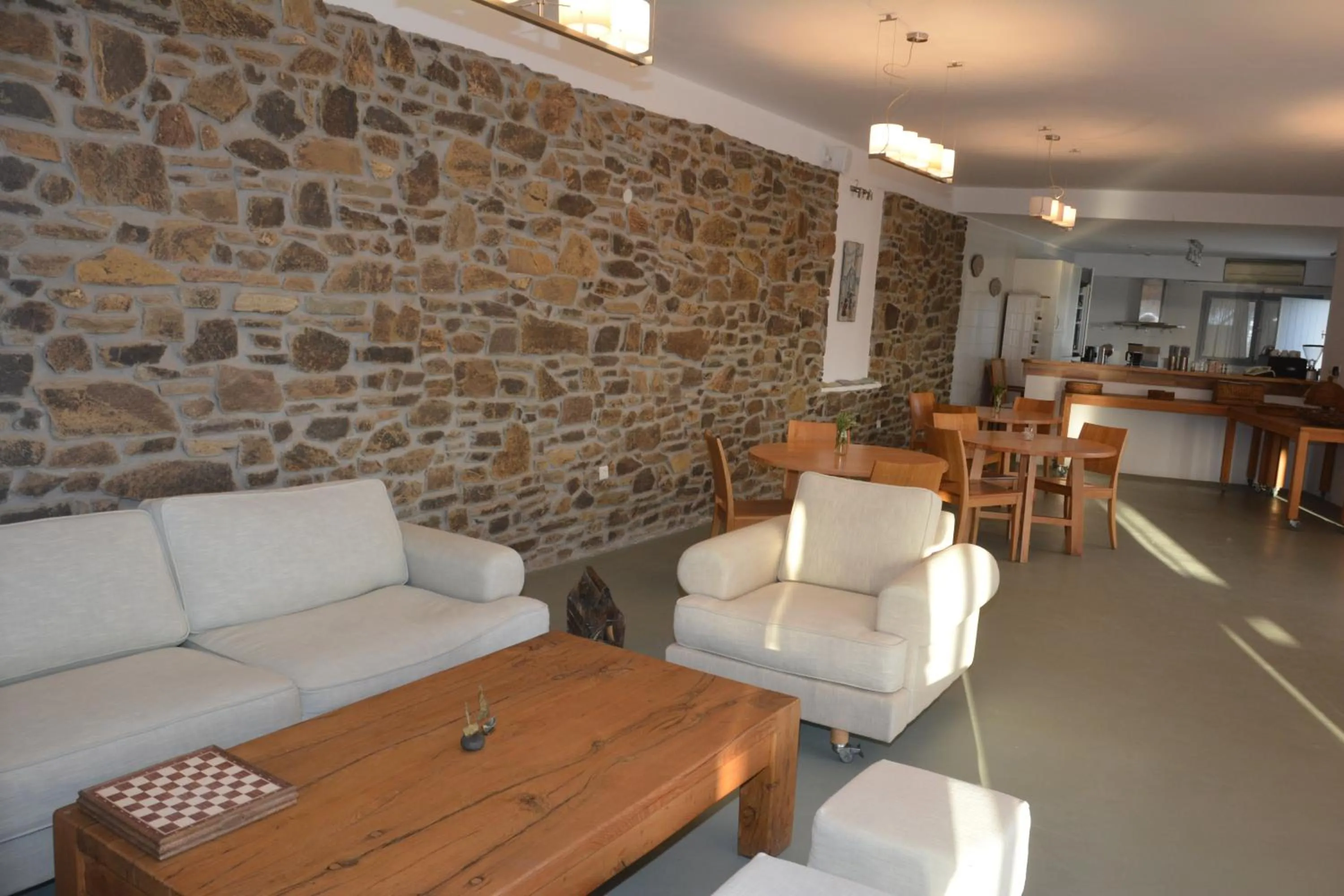Communal lounge/ TV room in Celini Suites Hotel