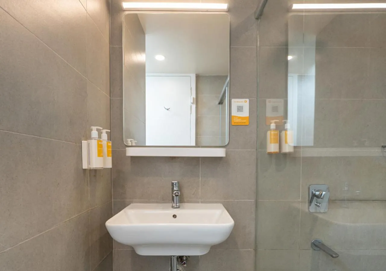Bathroom in Bloom Hotel - DLF Road Gachibowli