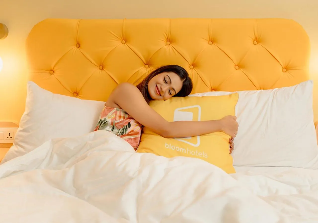 Living room, Bed in Bloom Hotel - DLF Road Gachibowli