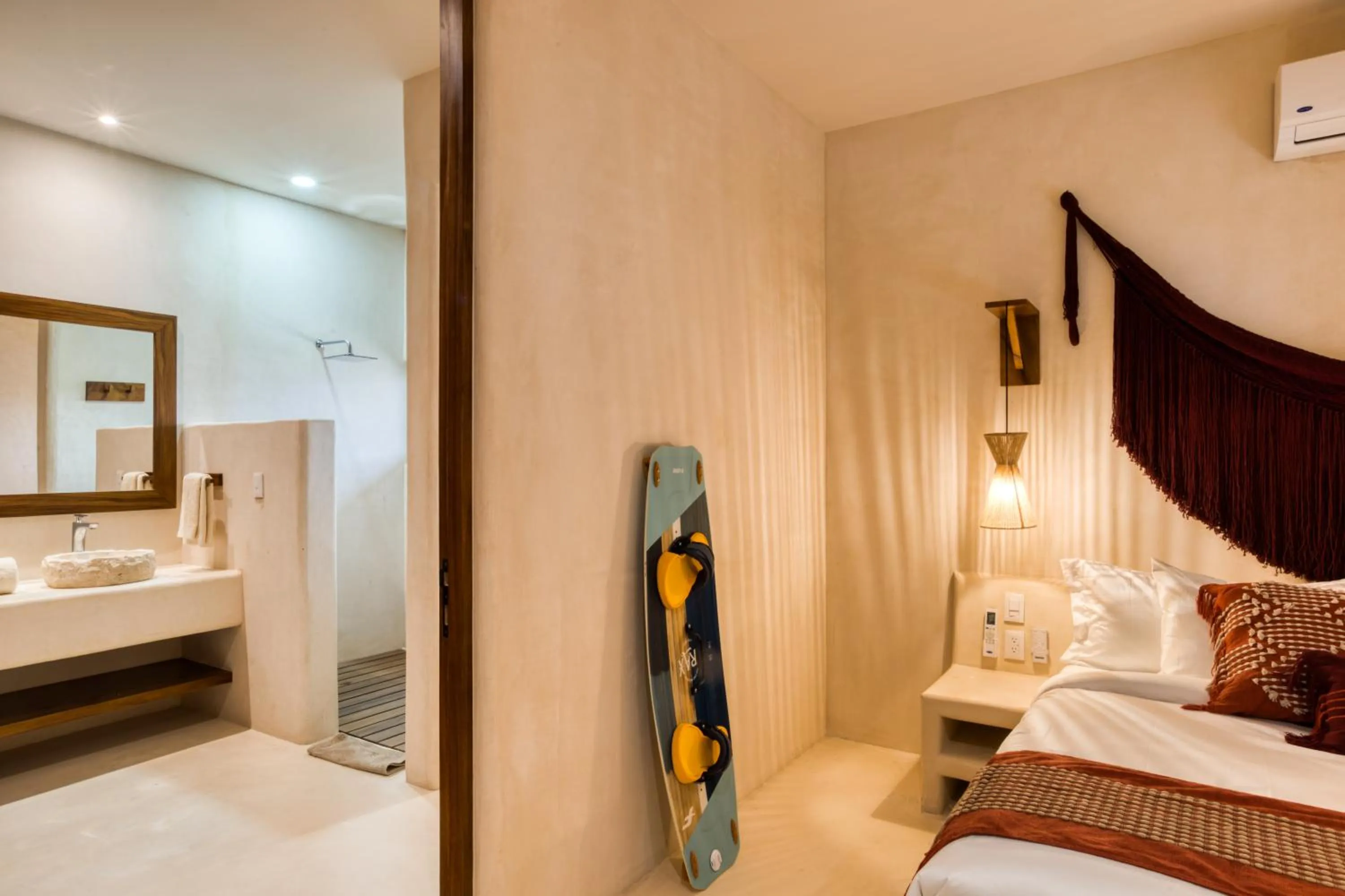Bed in Amina Wind Resort by Tasman