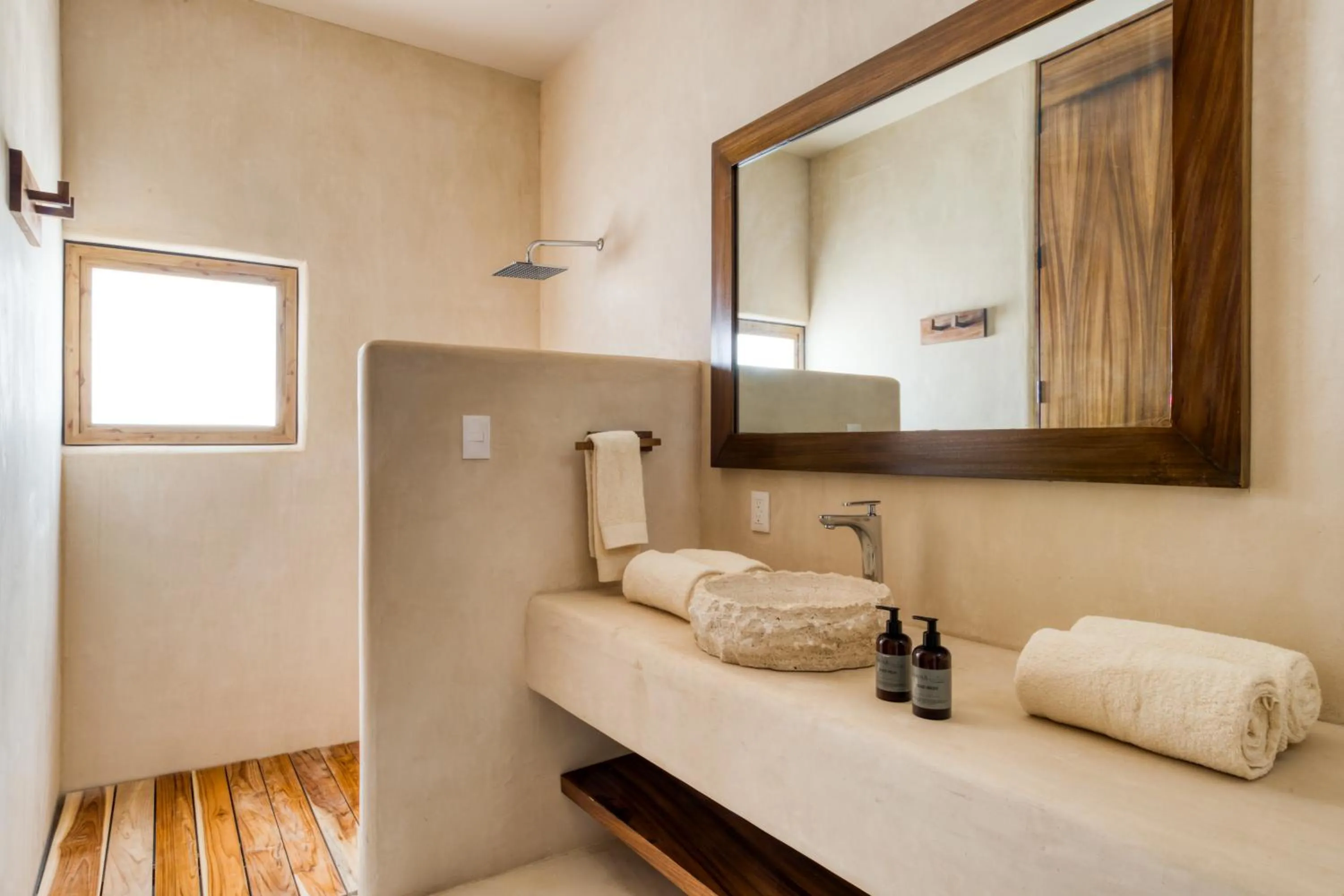 Bathroom, Bed in Amina Wind Resort by Tasman
