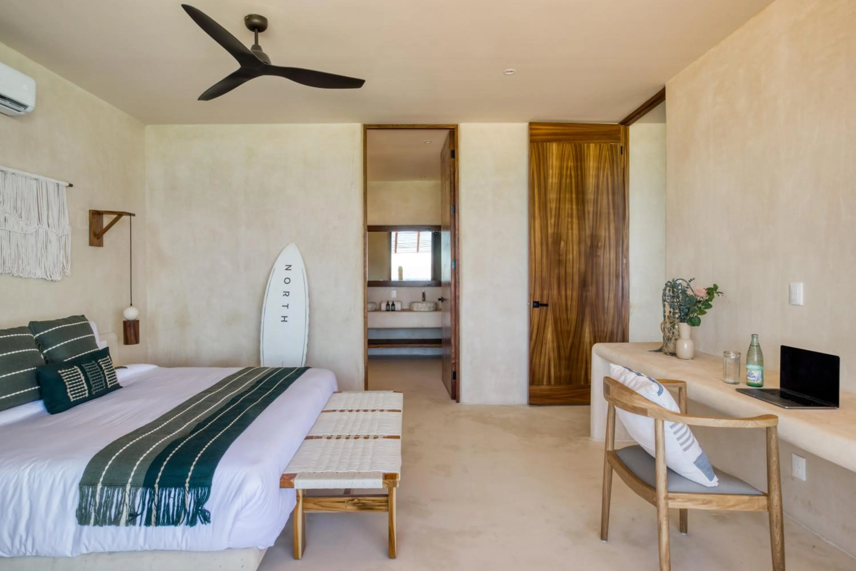 Bed in Amina Wind Resort by Tasman