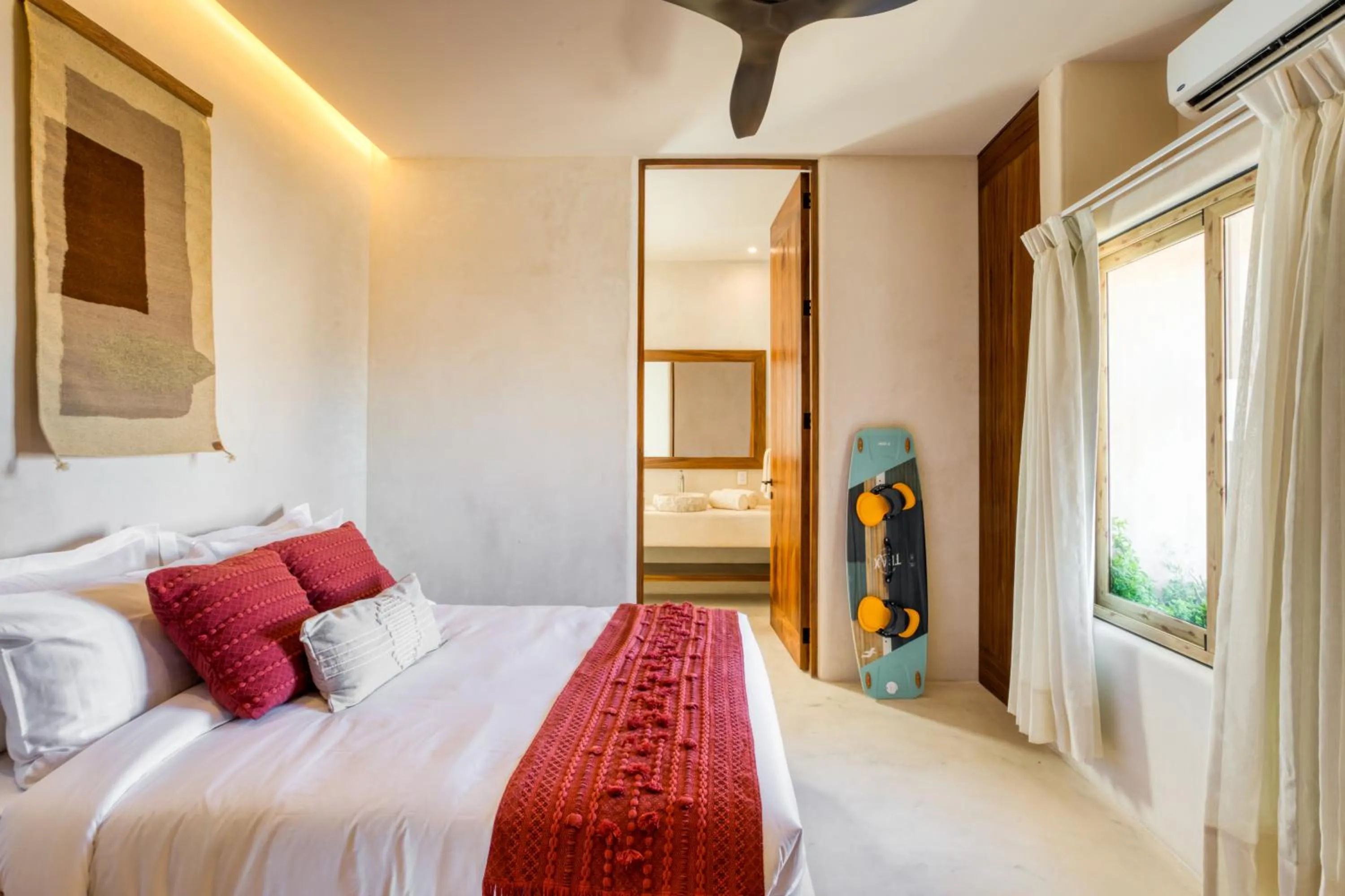 Bed in Amina Wind Resort by Tasman