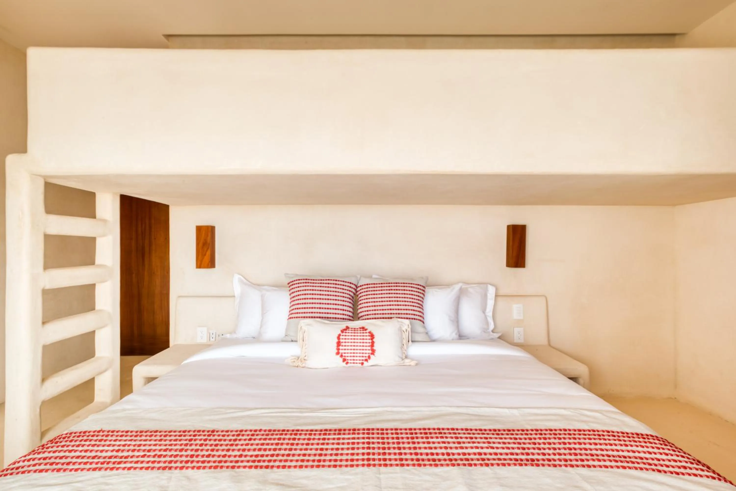 Bed in Amina Wind Resort by Tasman