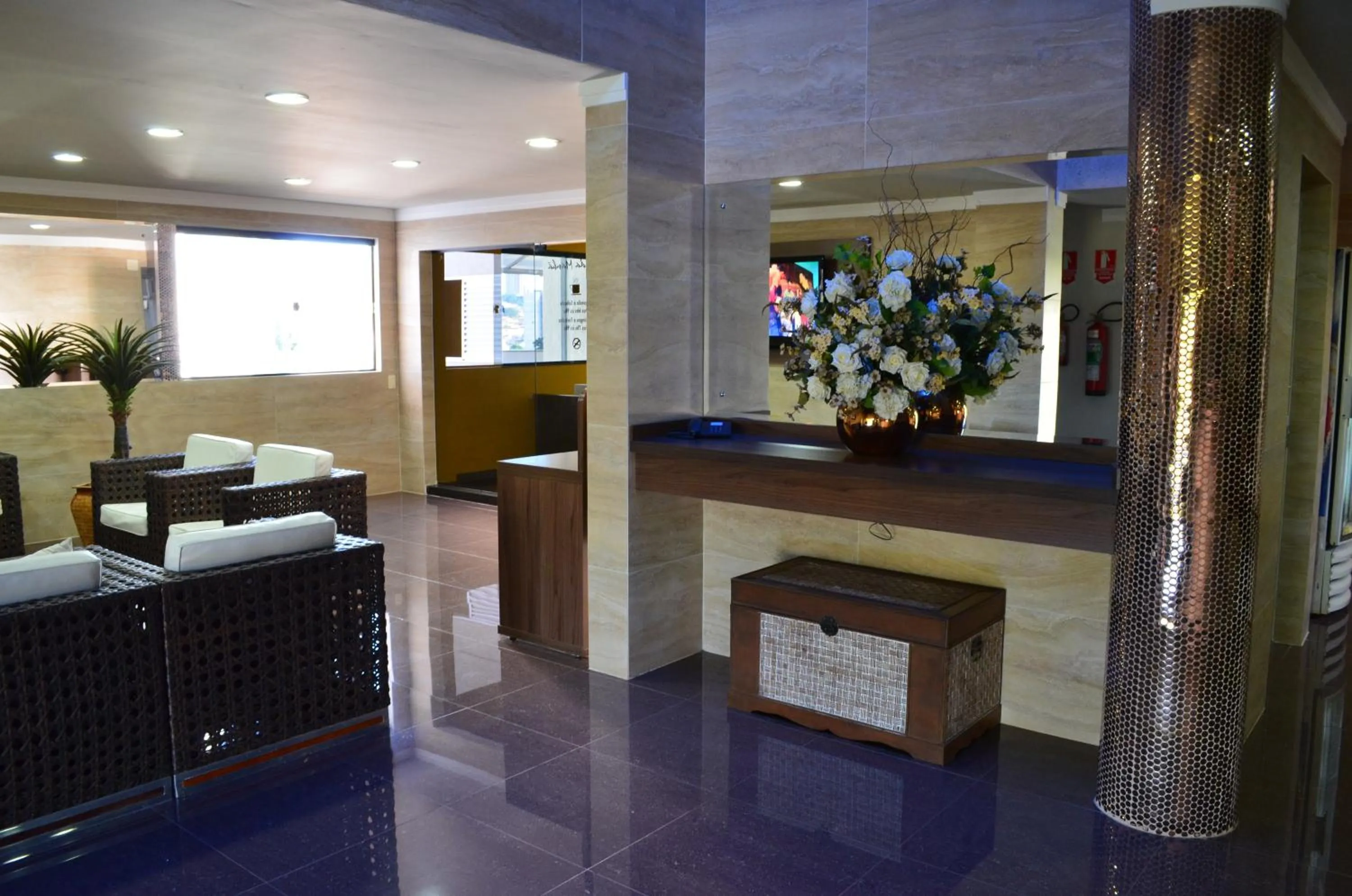 Communal lounge/ TV room in JP Palace Hotel