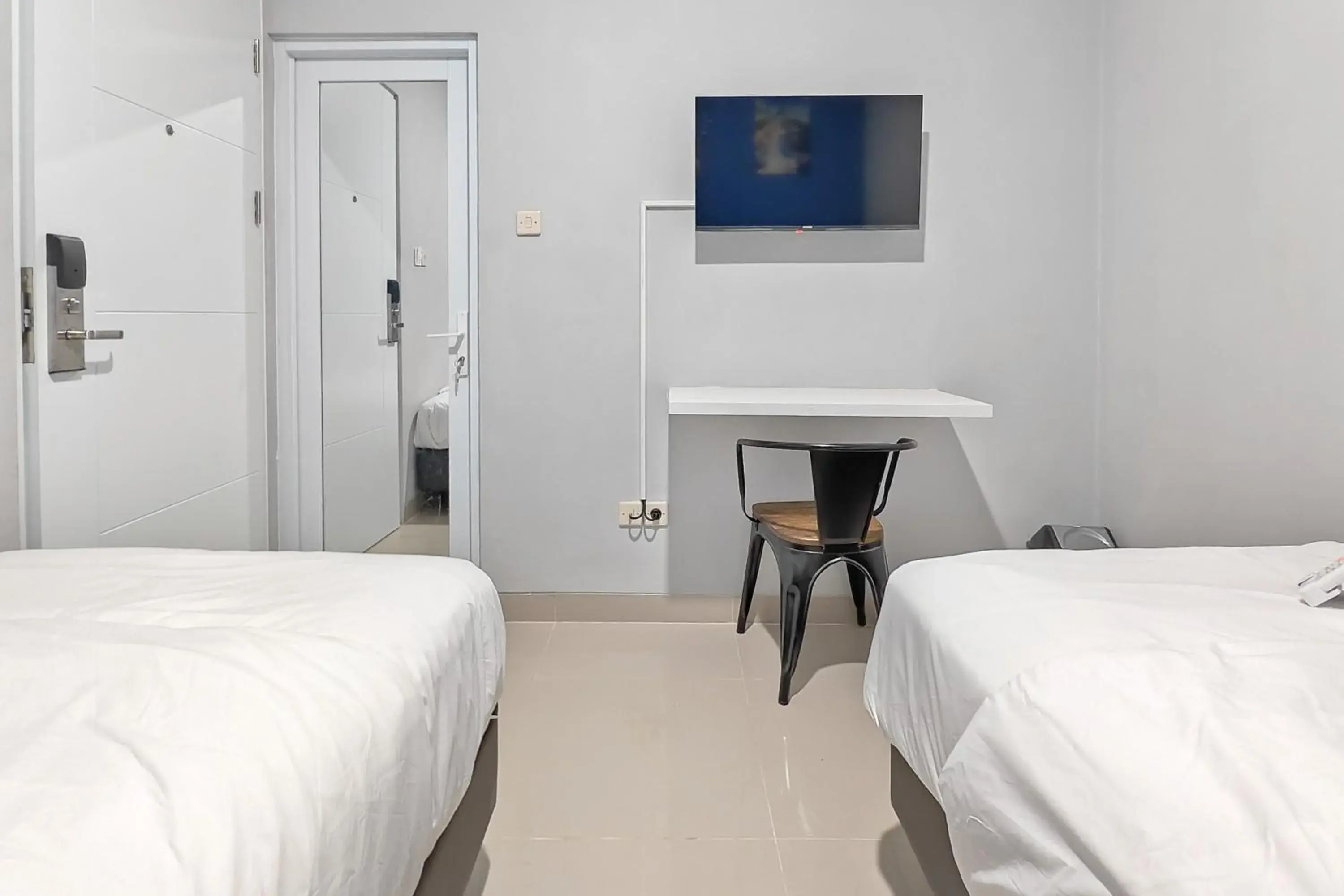 Bedroom in Urbanview Green Lake Sunter Residence Bedroom in Urbanview Green Lake Sunter Residence