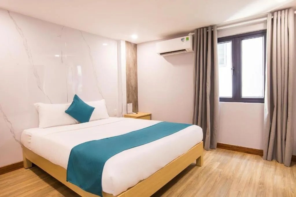 Bedroom, Bed in Blue Ocean Beachside Hotel Danang