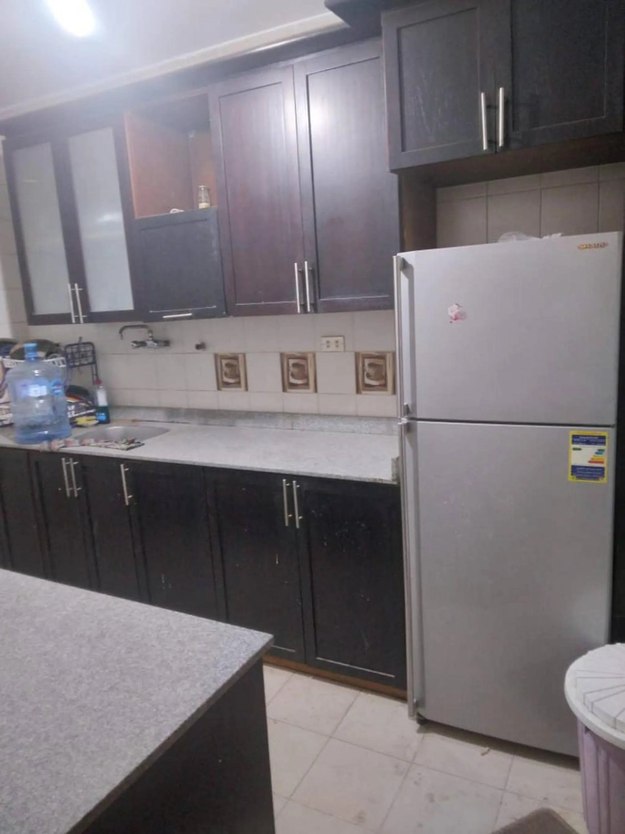 kitchen in Enjoying And Comfortable Stay