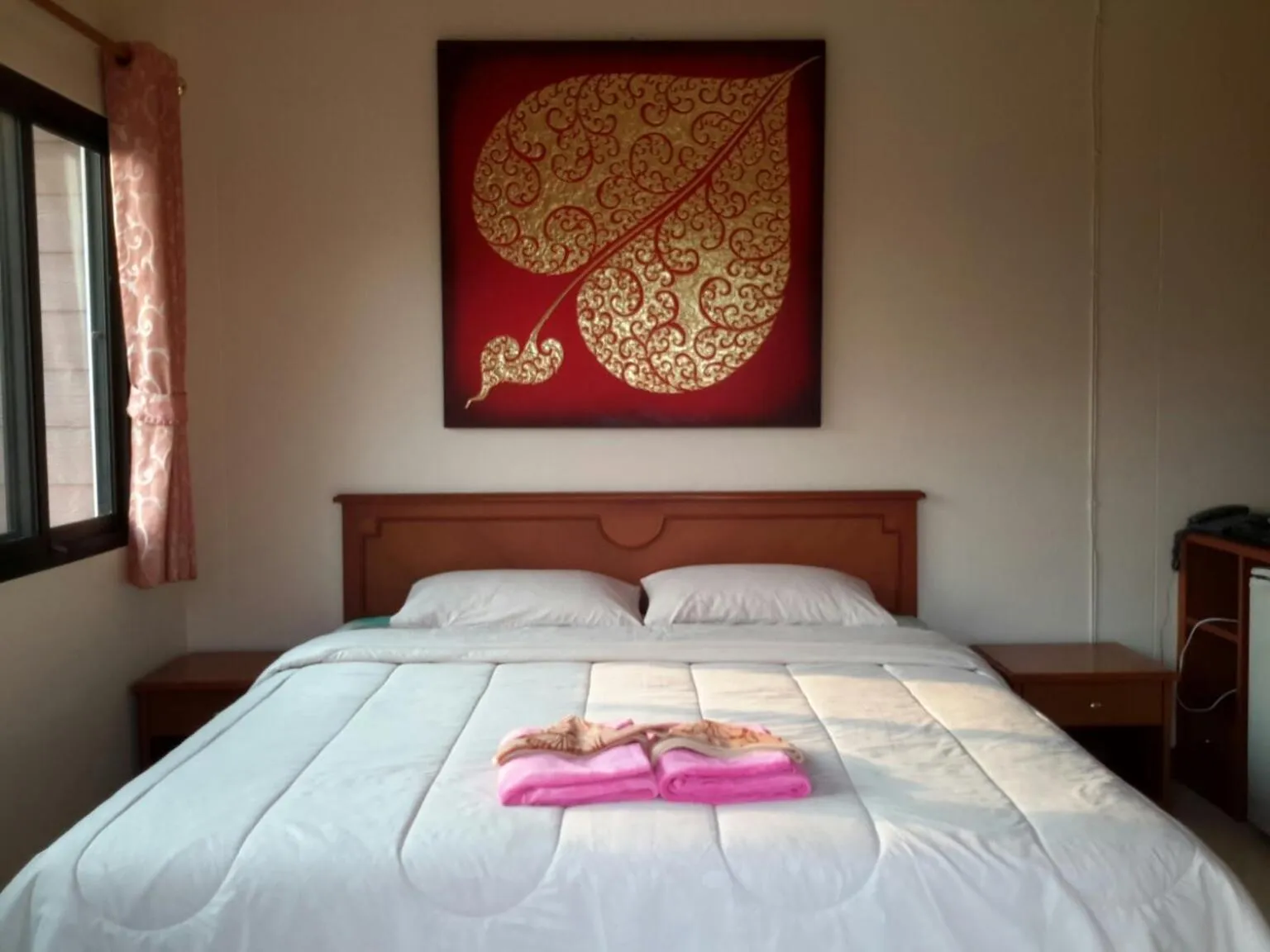 Bed in Donchai House Guest House& Cafe