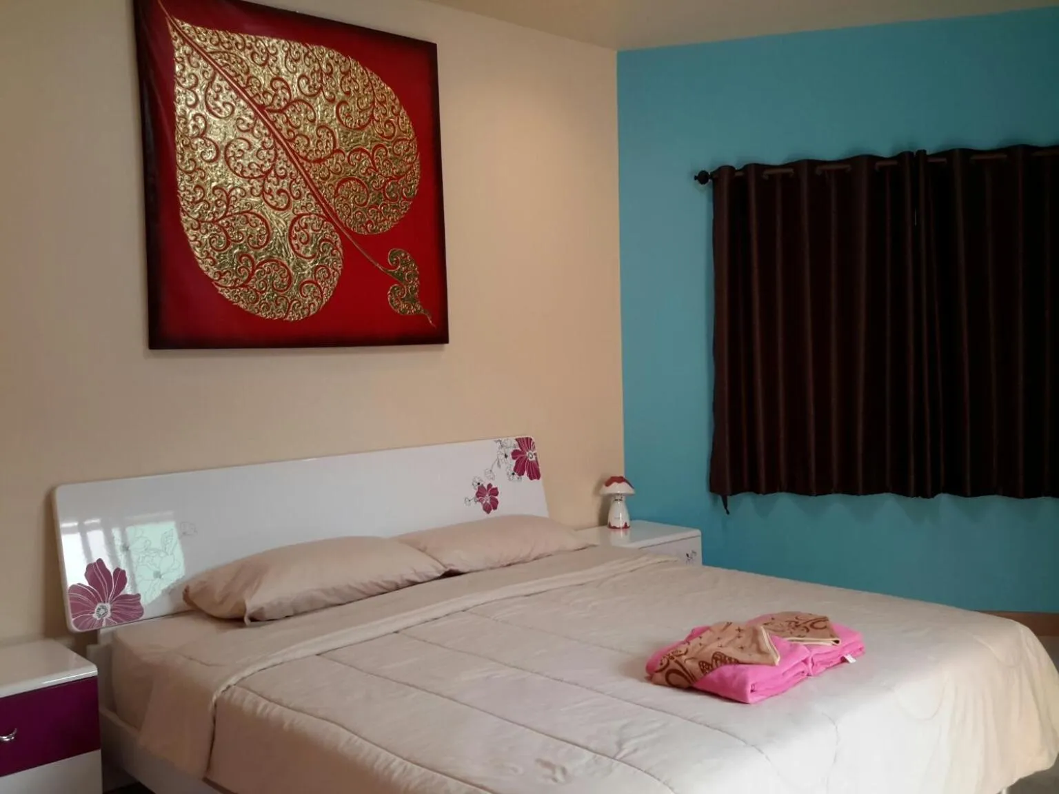 Bed in Donchai House Guest House& Cafe