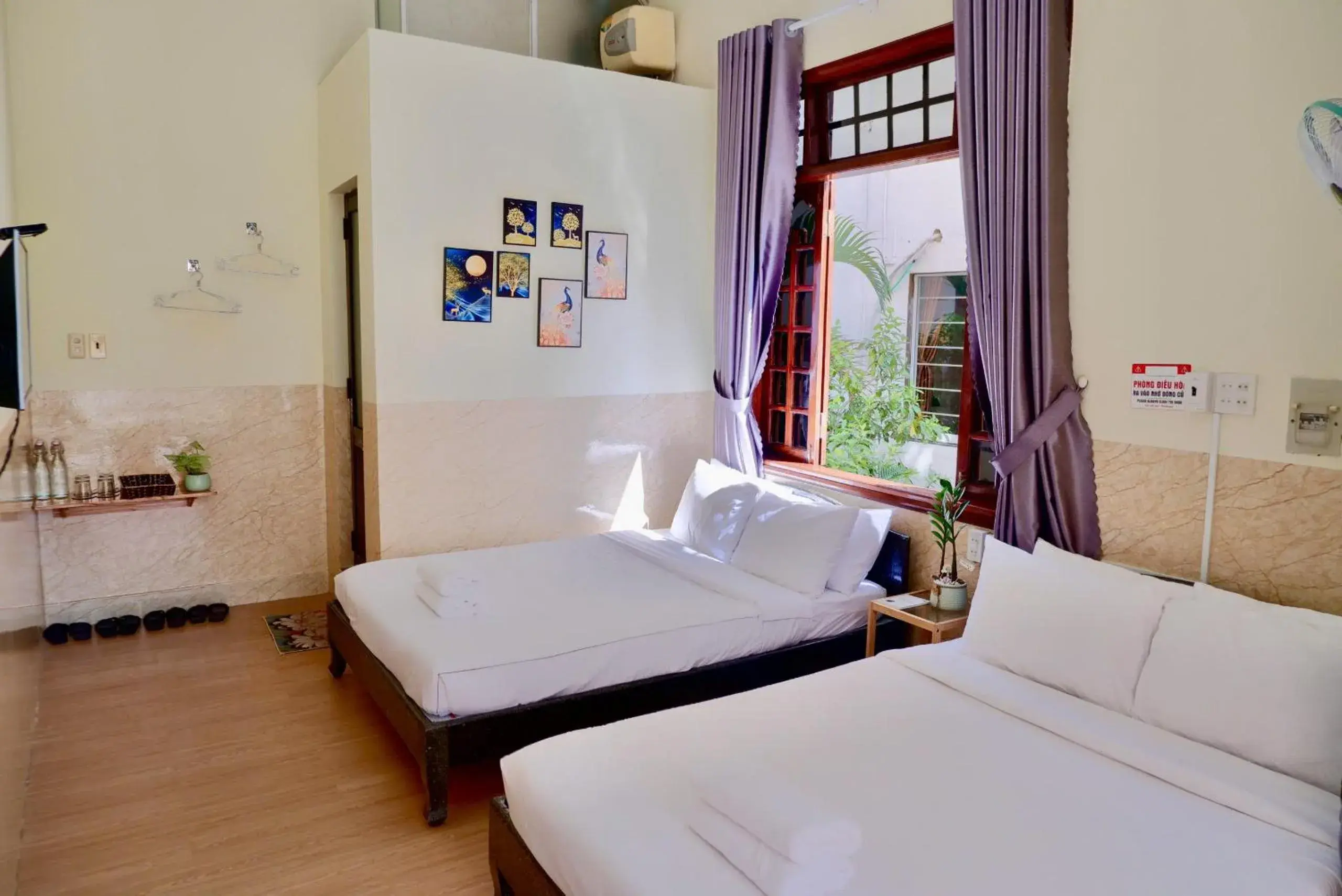 Quadruple Room with Balcony in Hue Ancient Town - Homestay in Hue Quadruple Room with Balcony in Hue Ancient Town - Homestay in Hue