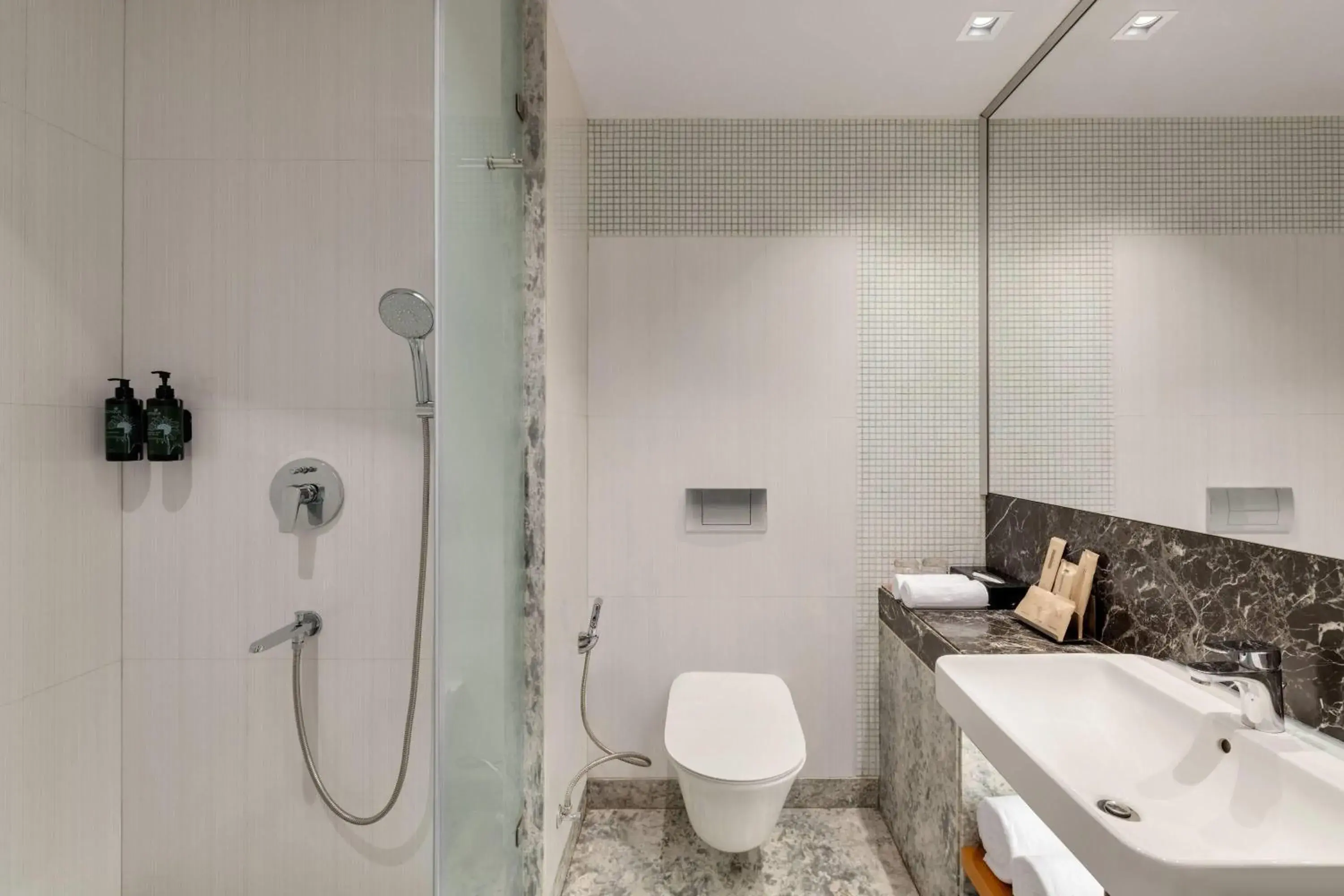 Bathroom in Ramada by Wyndham Ghaziabad Vasundhara Bathroom in Ramada by Wyndham Ghaziabad Vasundhara