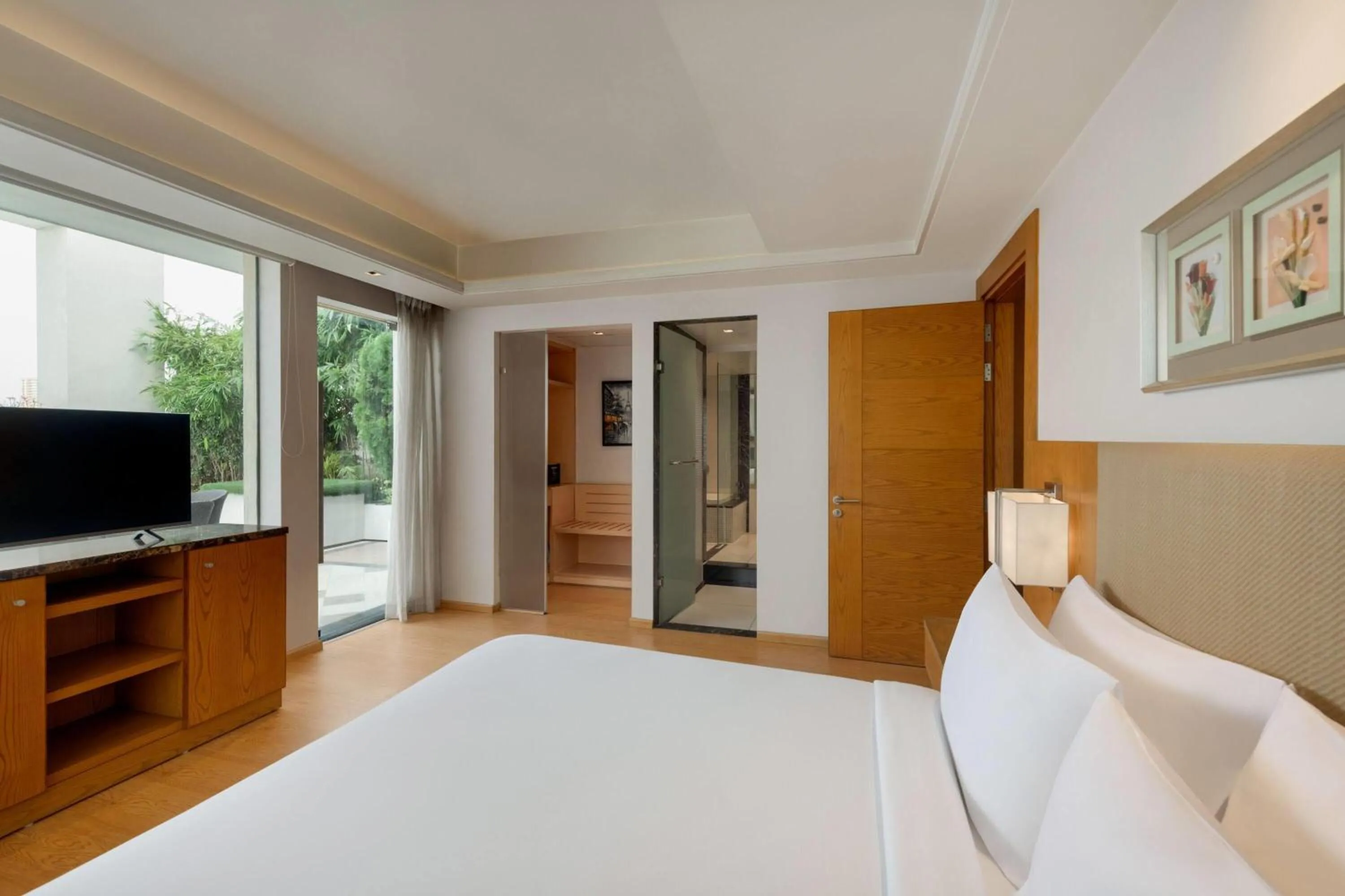 Photo of the whole room, Bed in Ramada by Wyndham Ghaziabad Vasundhara