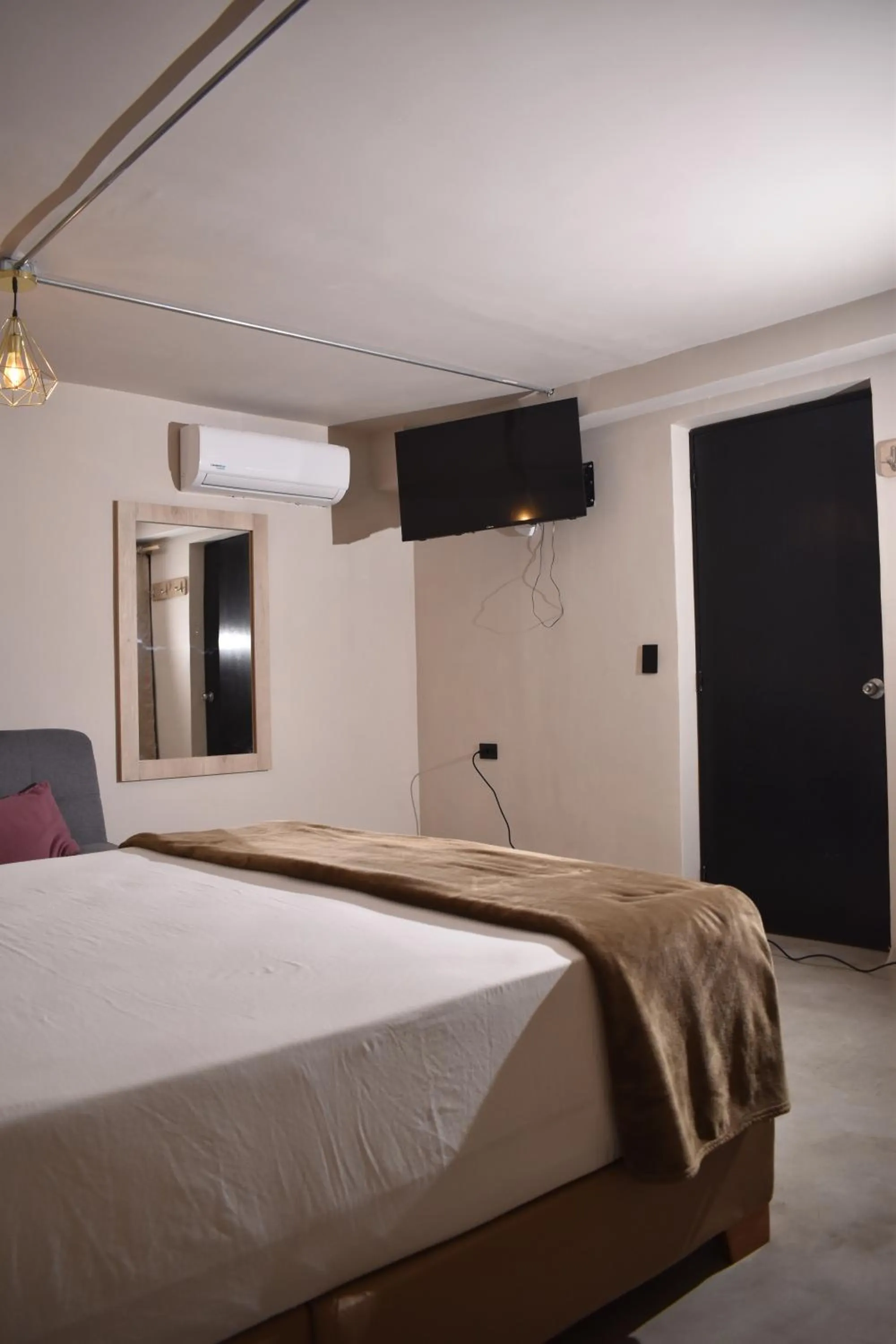 Photo of the whole room, Bed in History Center Hotel