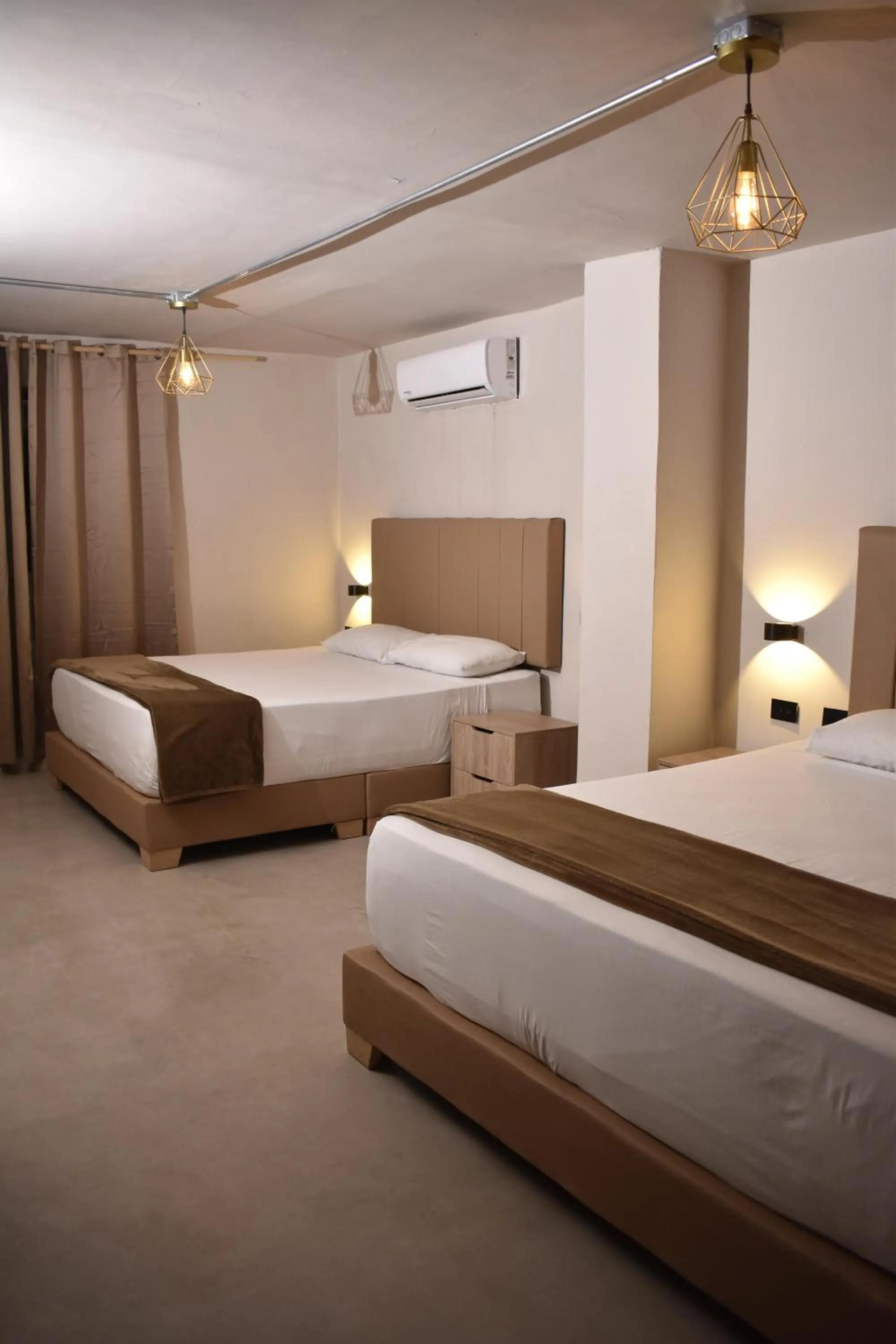 Photo of the whole room, Bed in History Center Hotel