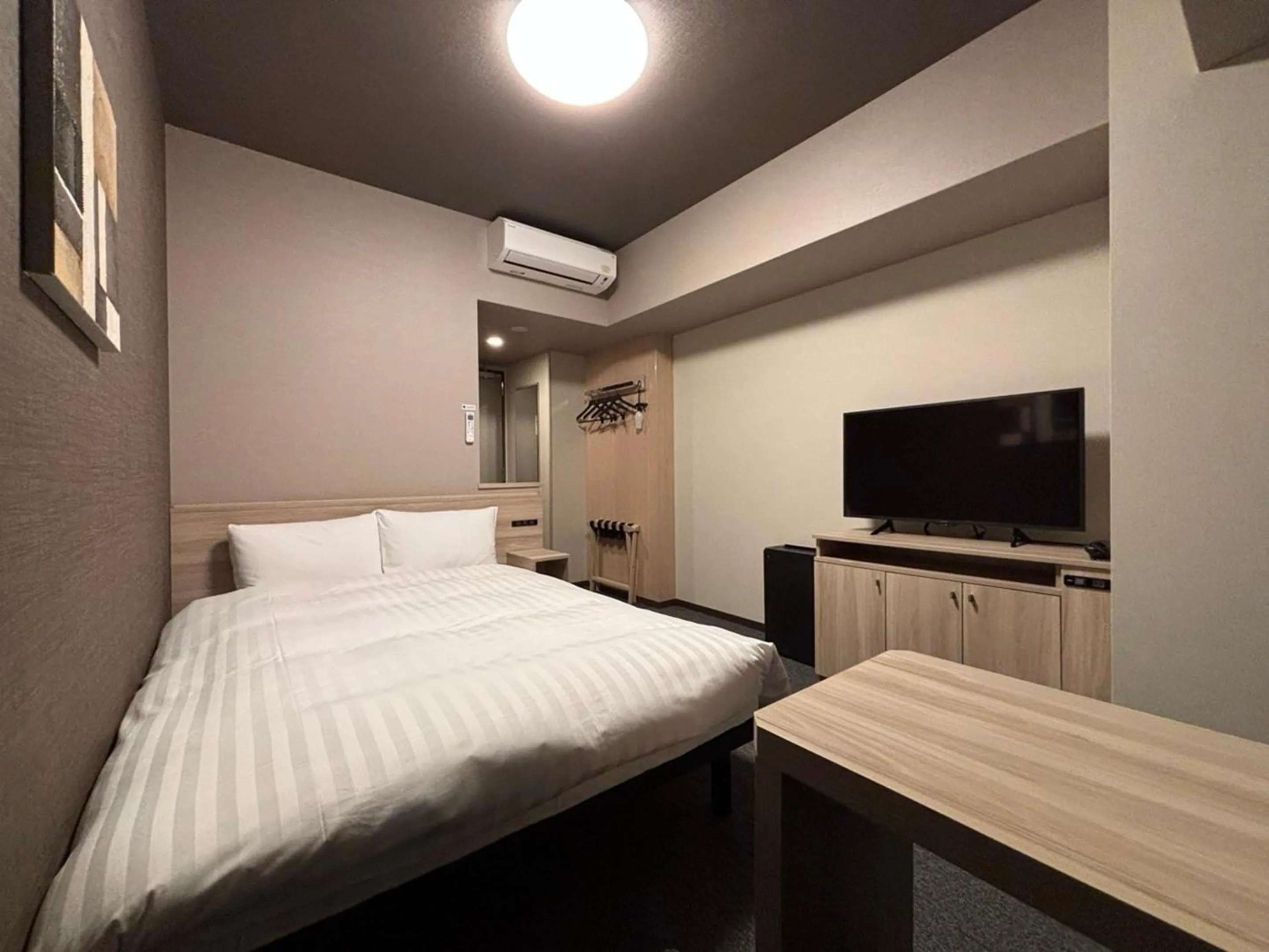 Photo of the whole room, Bed in Hotel Route Inn Kyoto Kumiyama