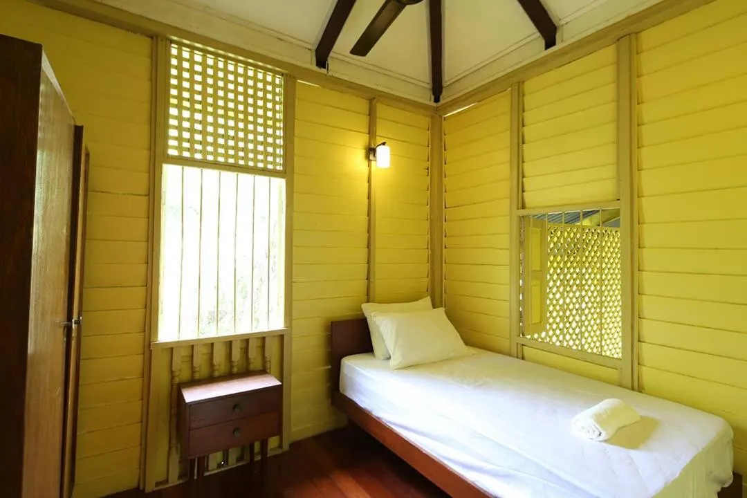 Bed in Bagas Zakariah Orchard Lodge