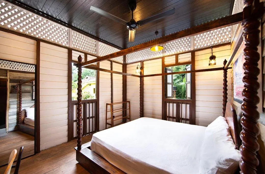 Bed in Bagas Zakariah Orchard Lodge