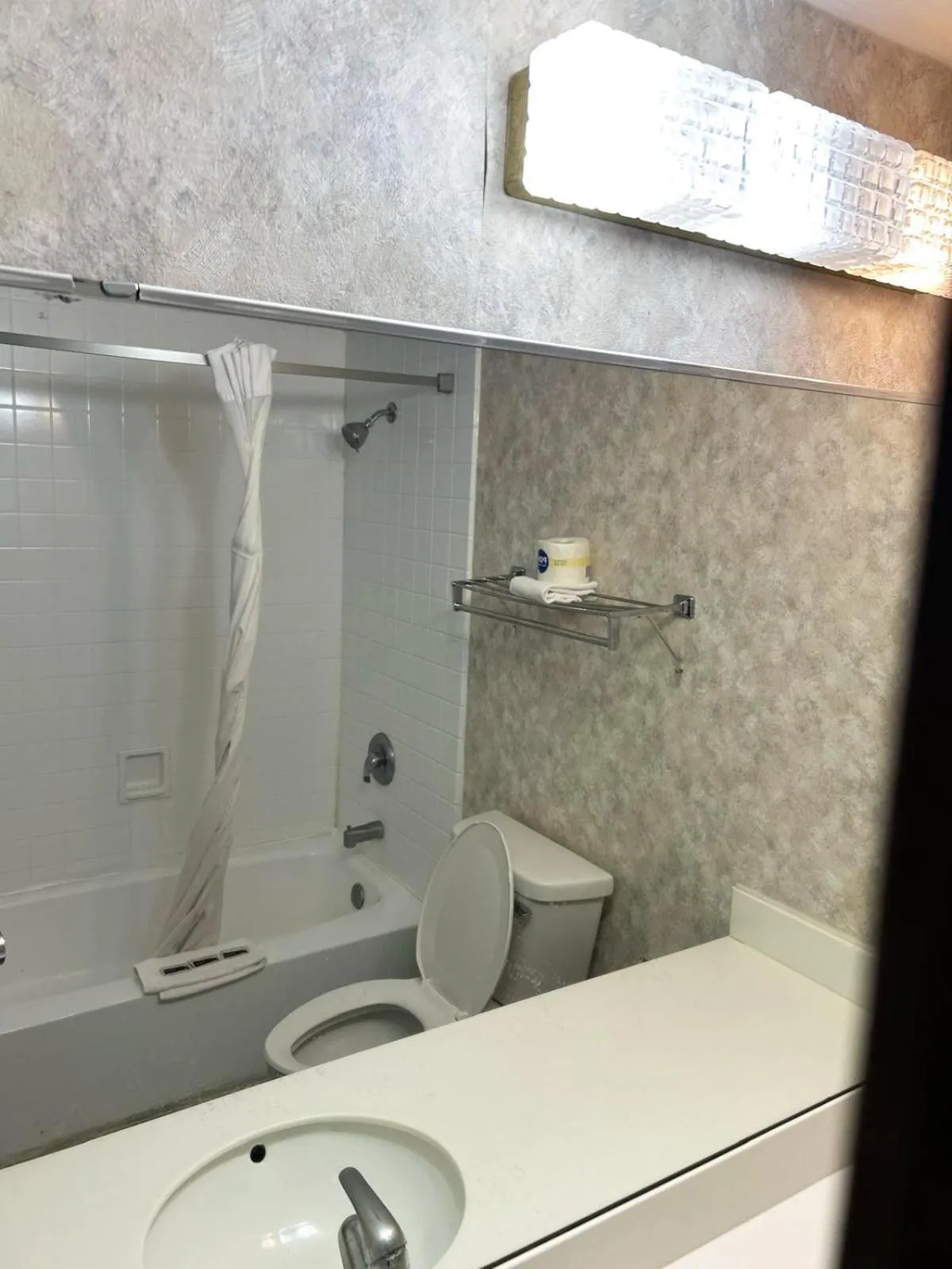 Toilet in Blue Way Inn & Suites La Crosse