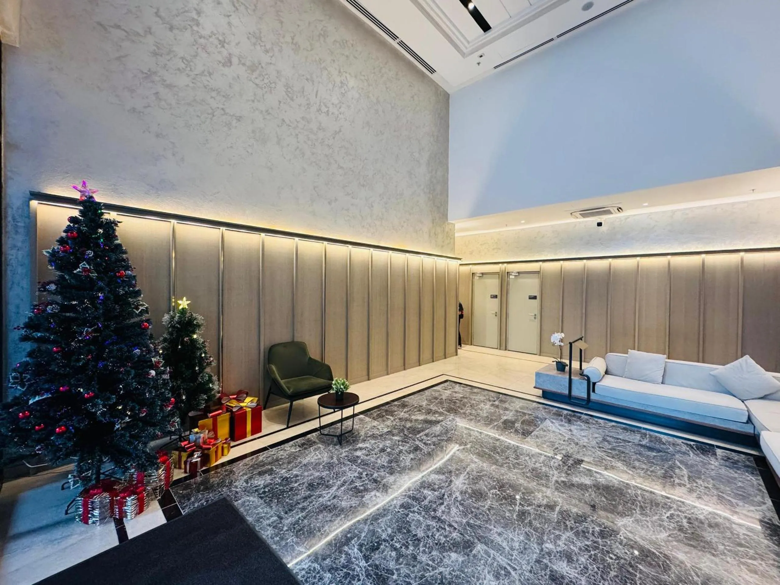 Seating area, Bed in Agile Bukit Bintang by DeUrban