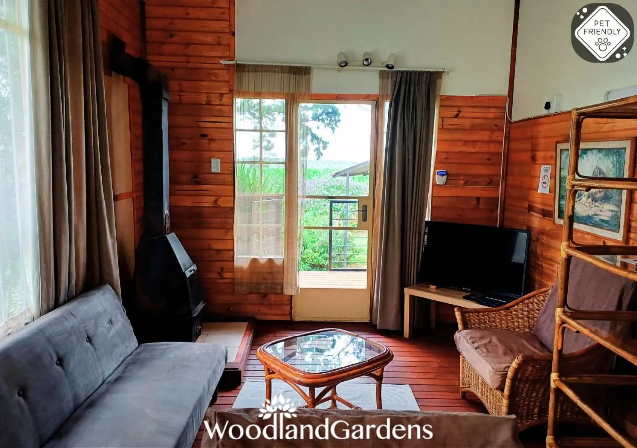 Communal lounge/ TV room in Woodland Gardens Self catering Pet Friendly Lodge