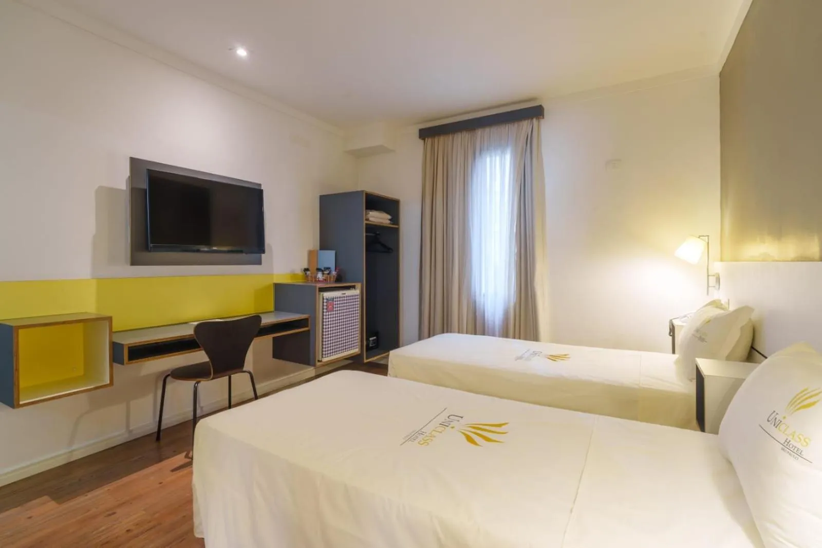 Bed in Uniclass Hotel Pinheiros