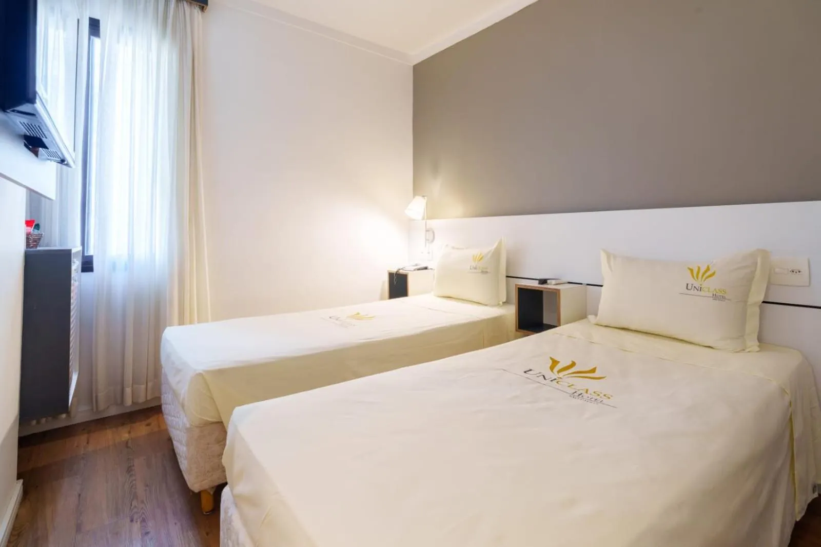 Bed in Uniclass Hotel Pinheiros