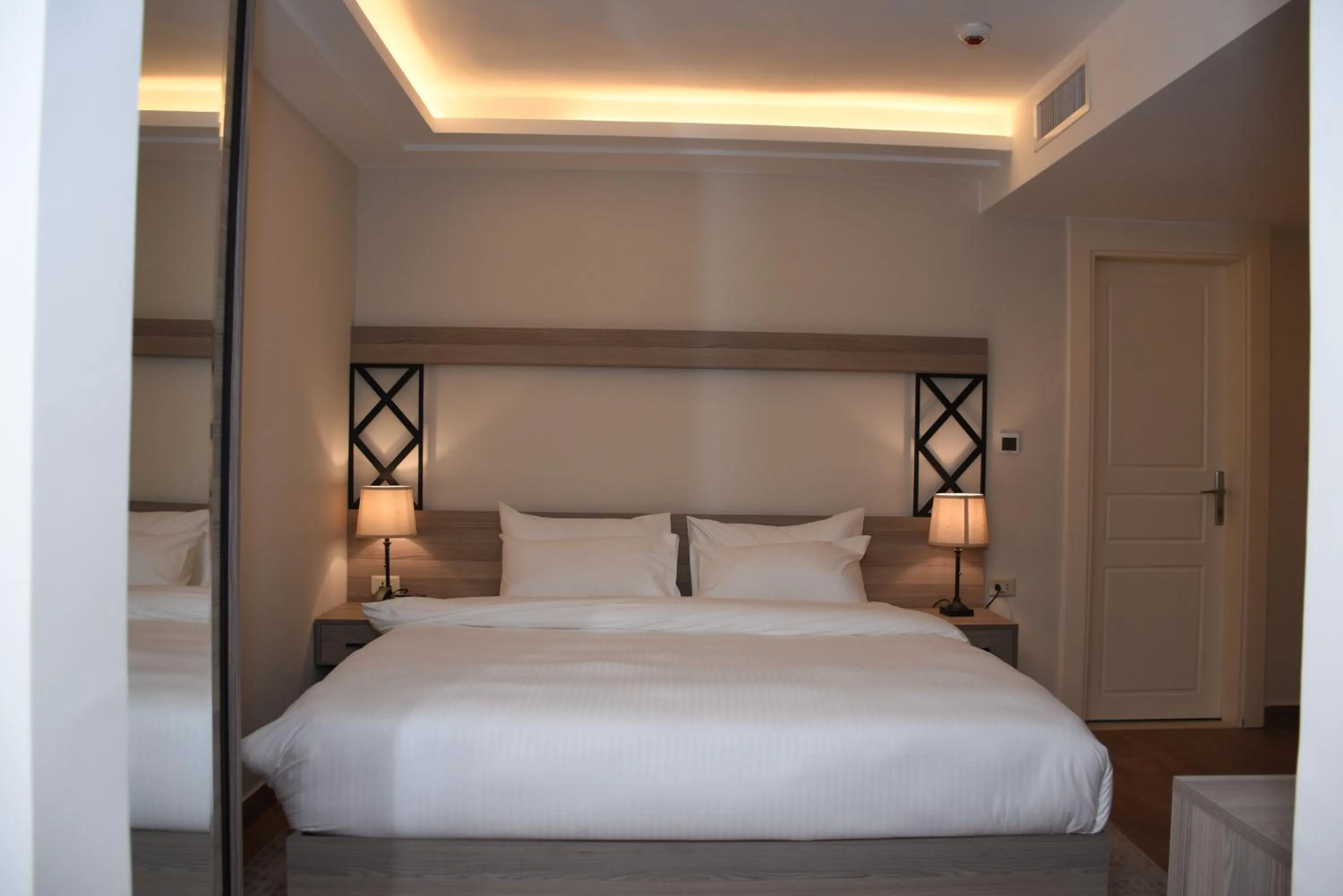 Bed in Sukoon Hotel Amman