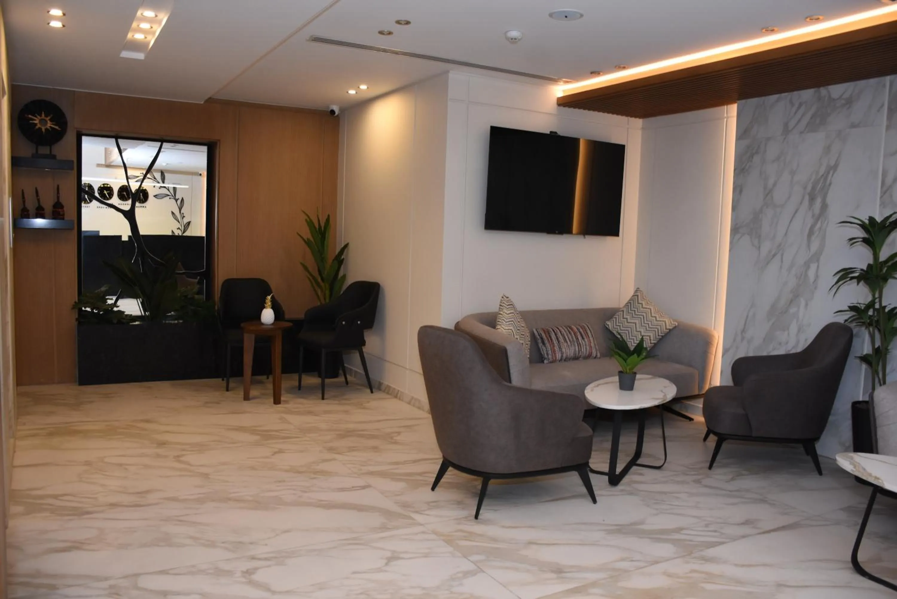 Communal lounge/ TV room in Sukoon Hotel Amman