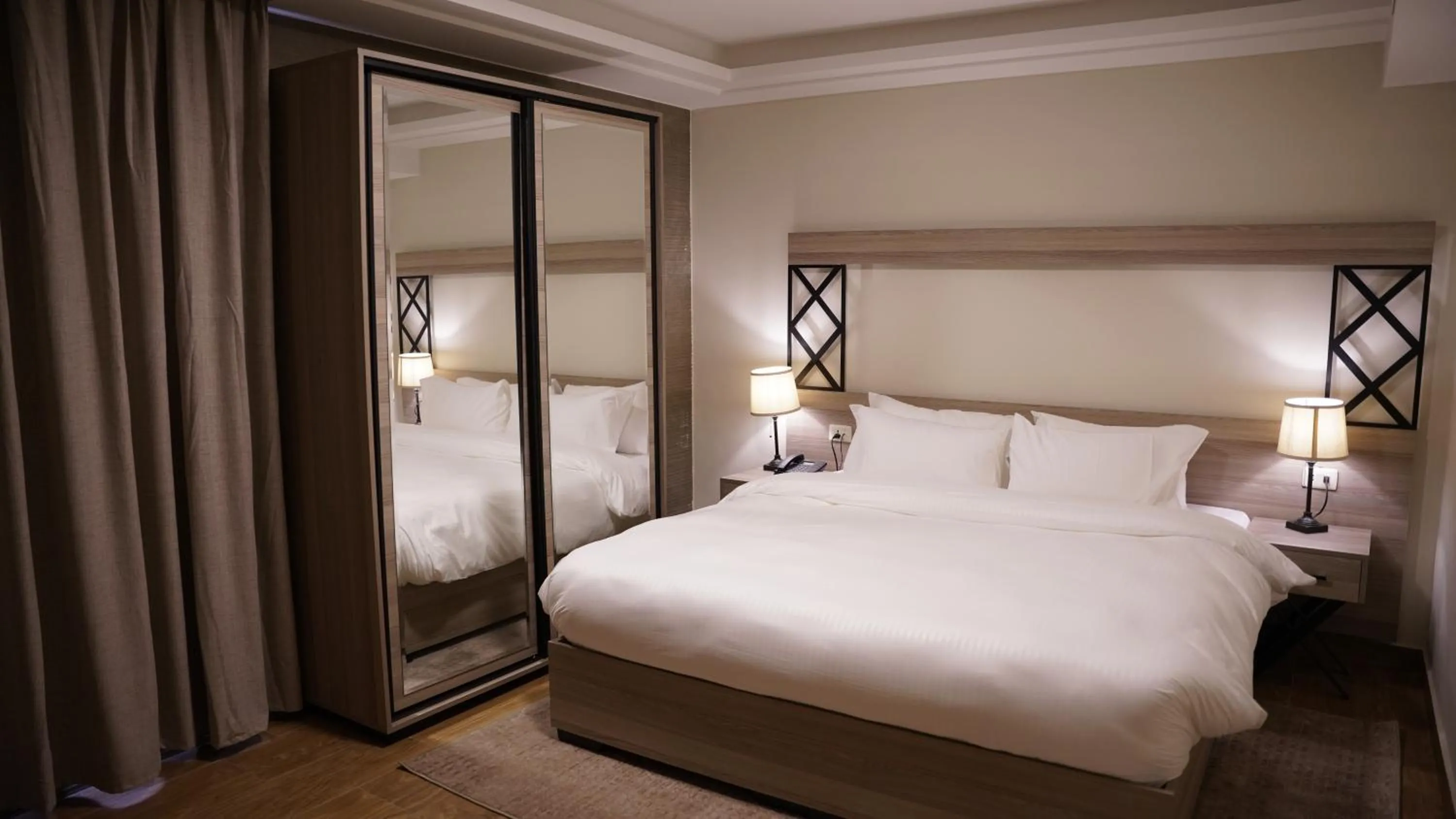 Bed in Sukoon Hotel Amman