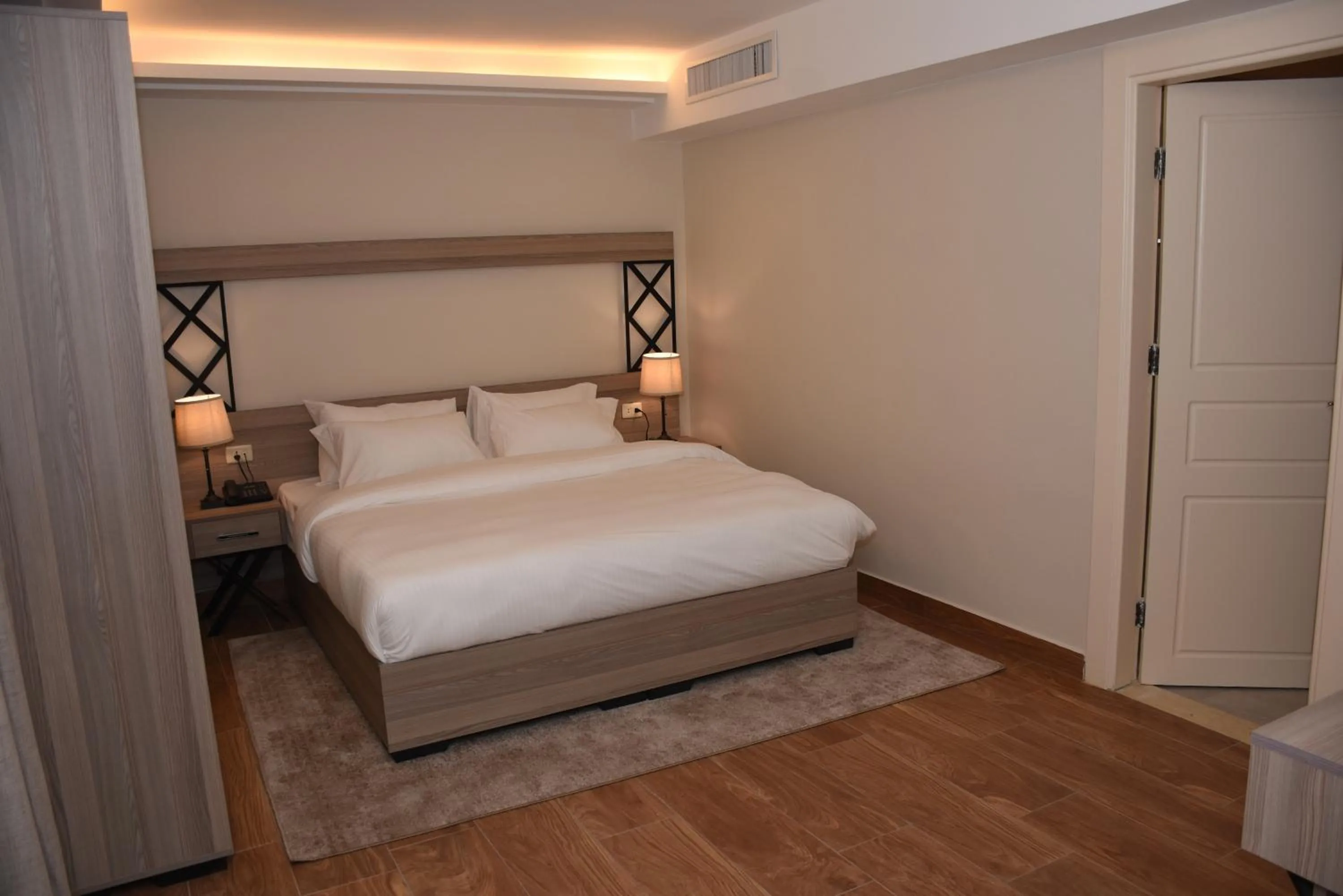 Bed in Sukoon Hotel Amman