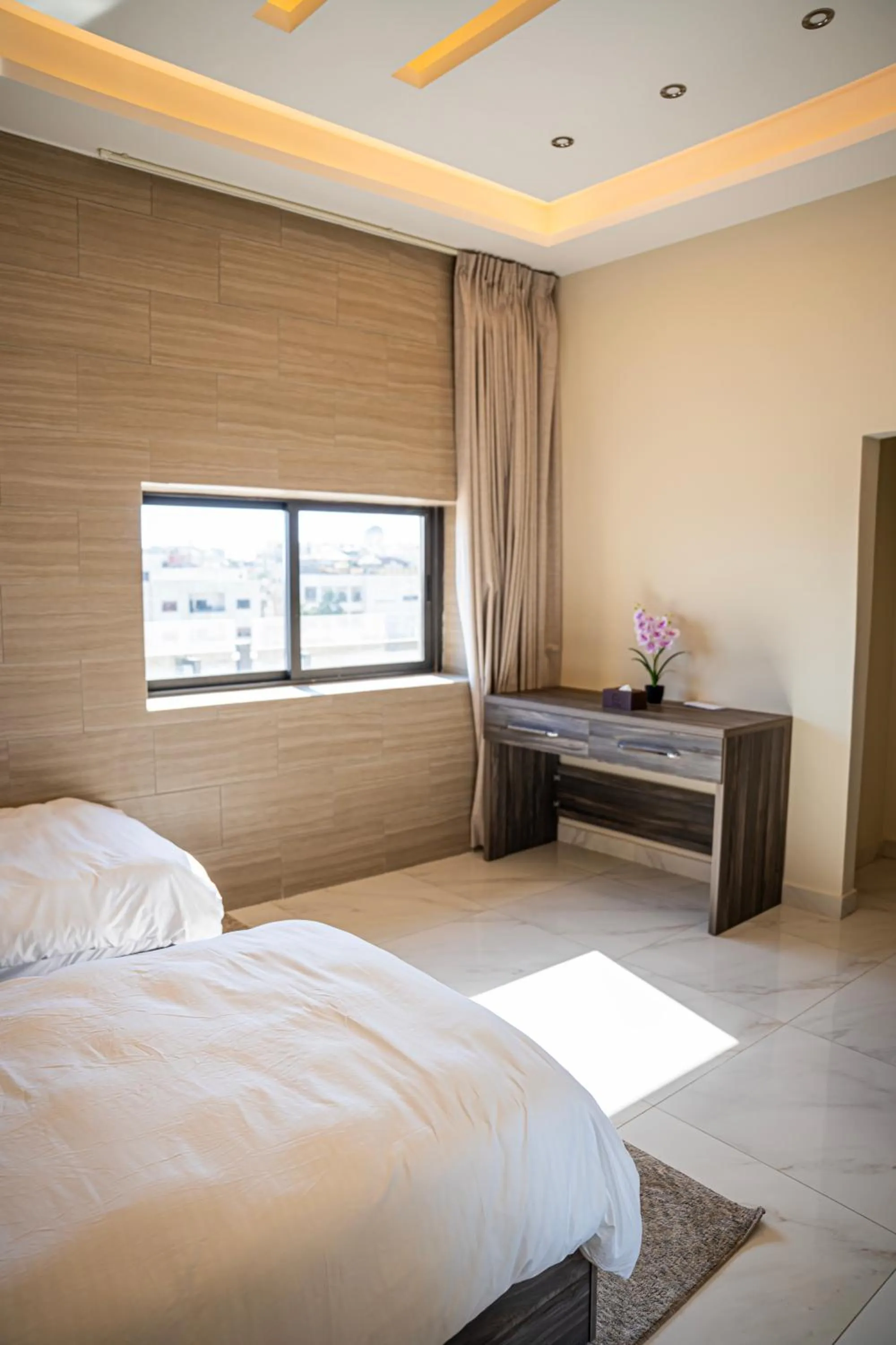 Bed in Sukoon Hotel Amman