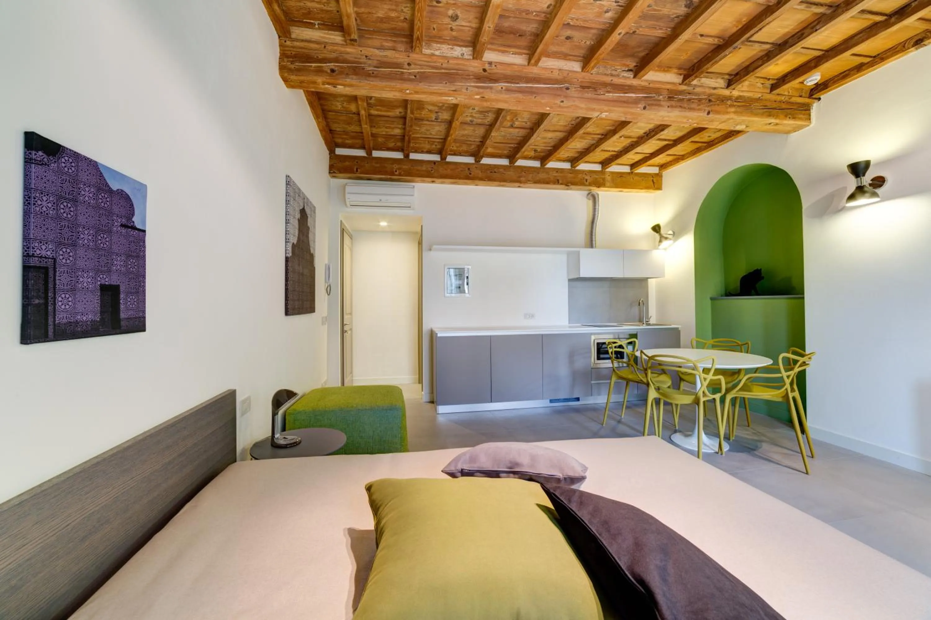 Bed in Palazzo Mannaioni Suites