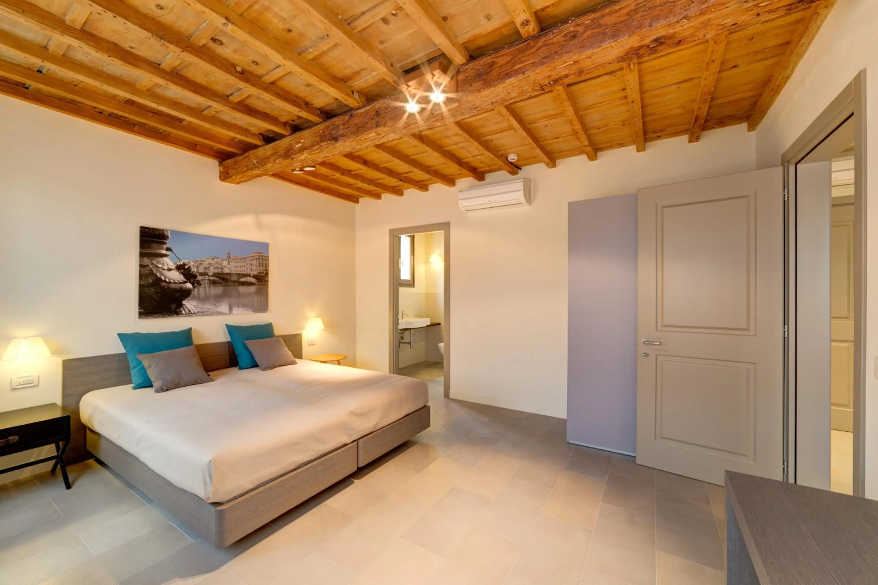 Bed in Palazzo Mannaioni Suites