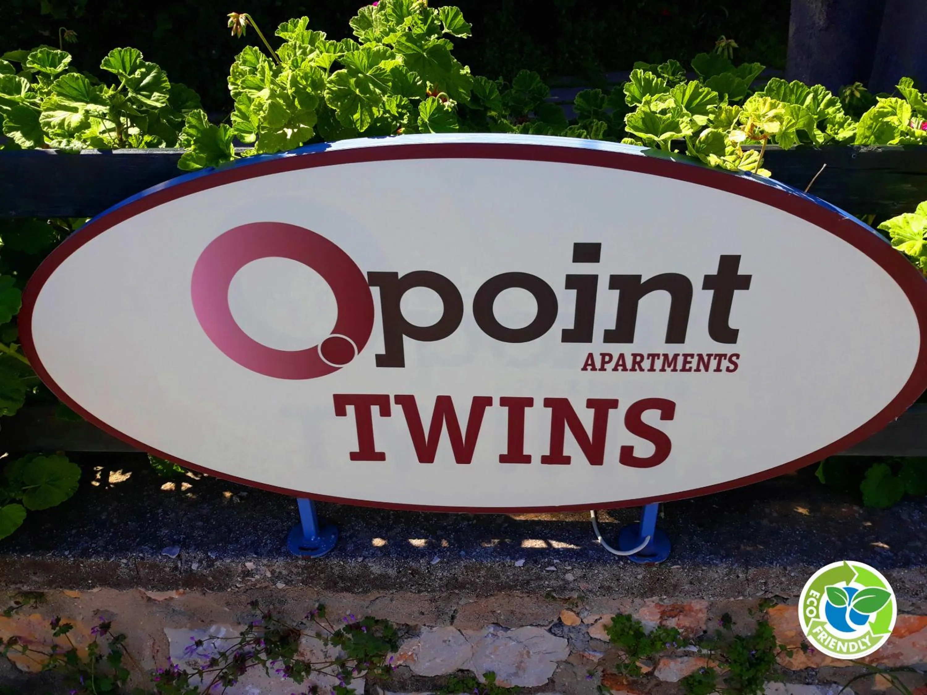 Property logo or sign in Point Twins Apartments