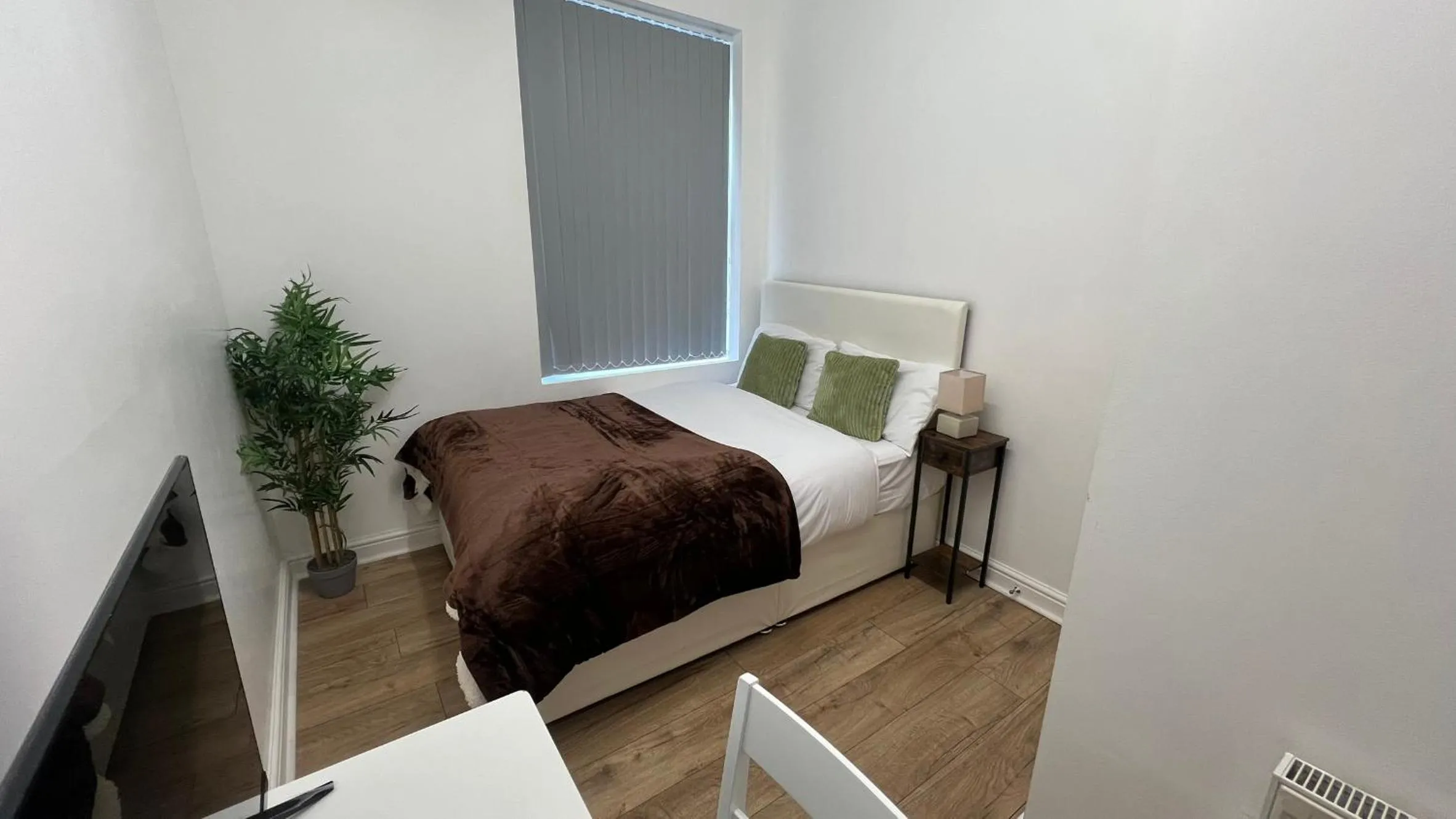 Bed in Sangha Hall - Private Ensuite Rooms with Shared Kitchen