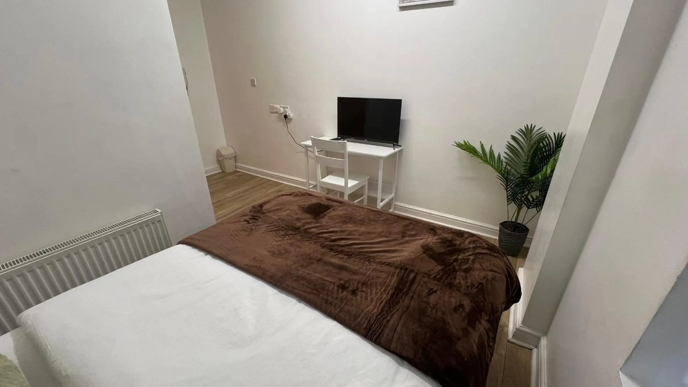 Bed in Sangha Hall - Private Ensuite Rooms with Shared Kitchen