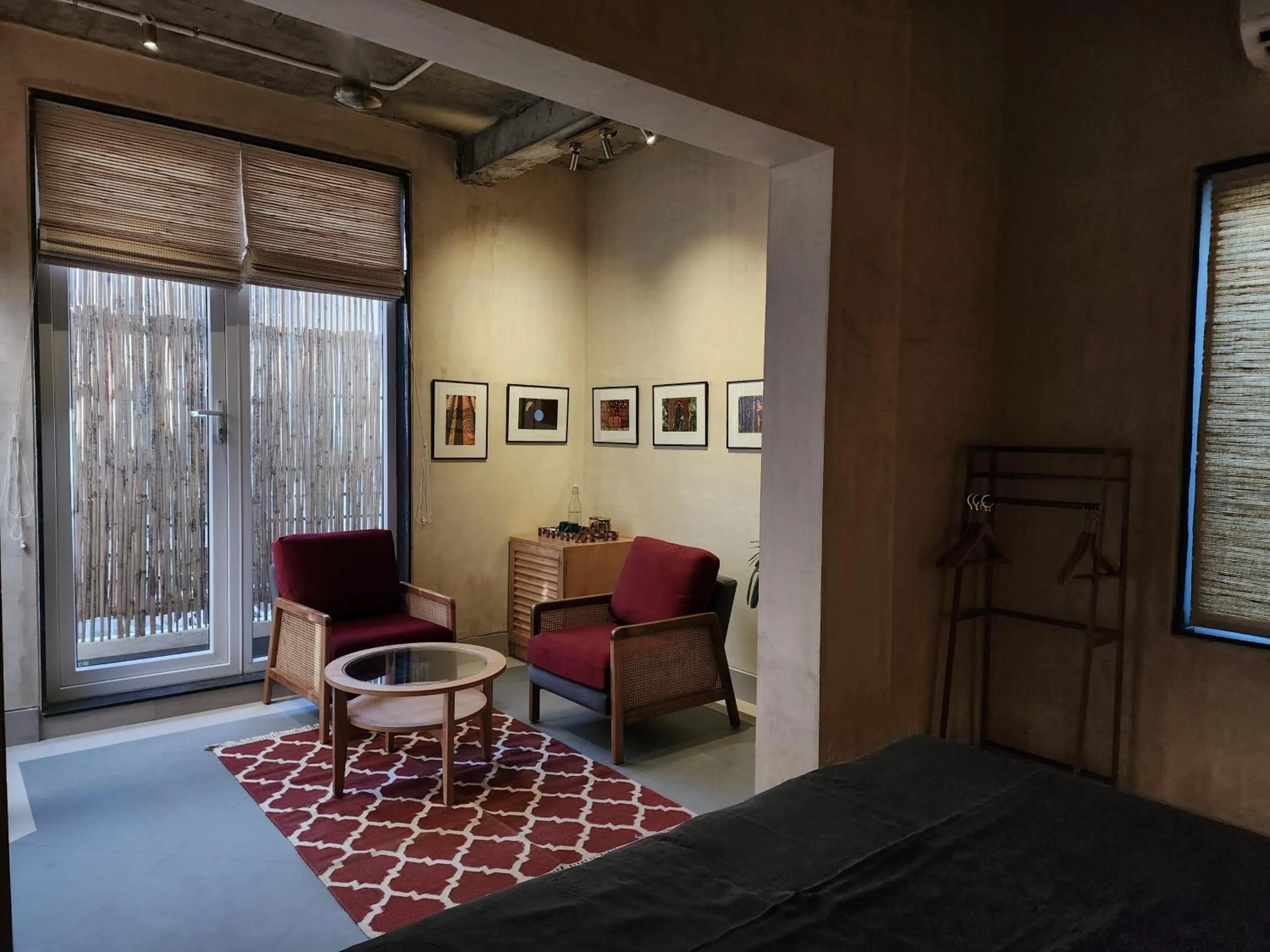 Seating area in JHouse near Bhikaji