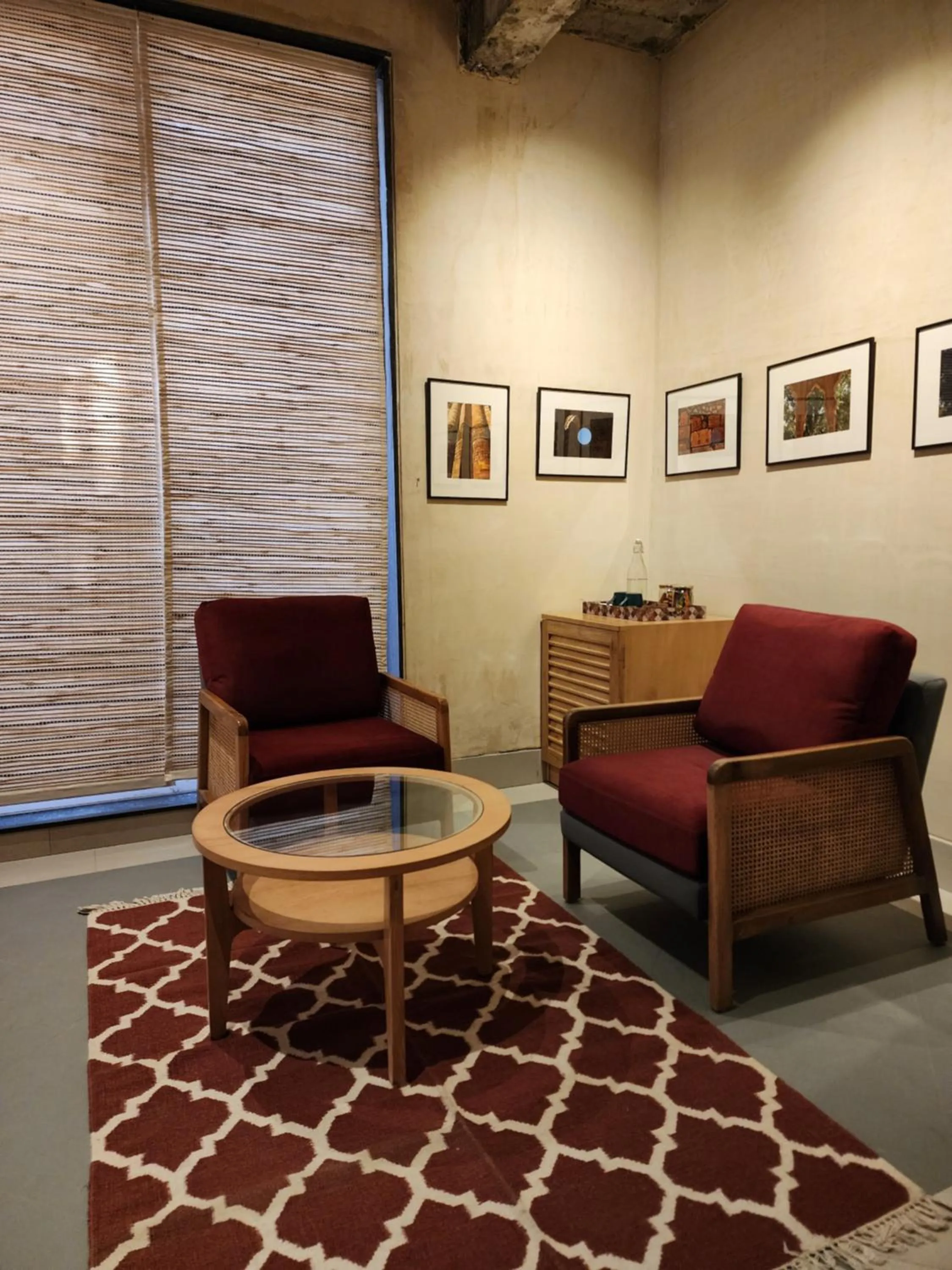 Seating area in JHouse near Bhikaji