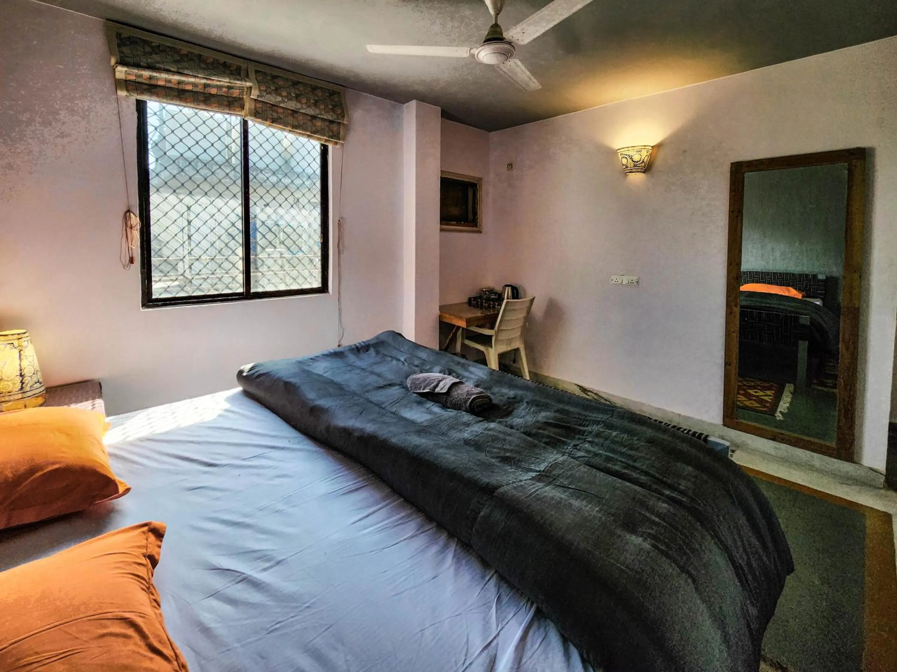 Bed in JHouse near Bhikaji