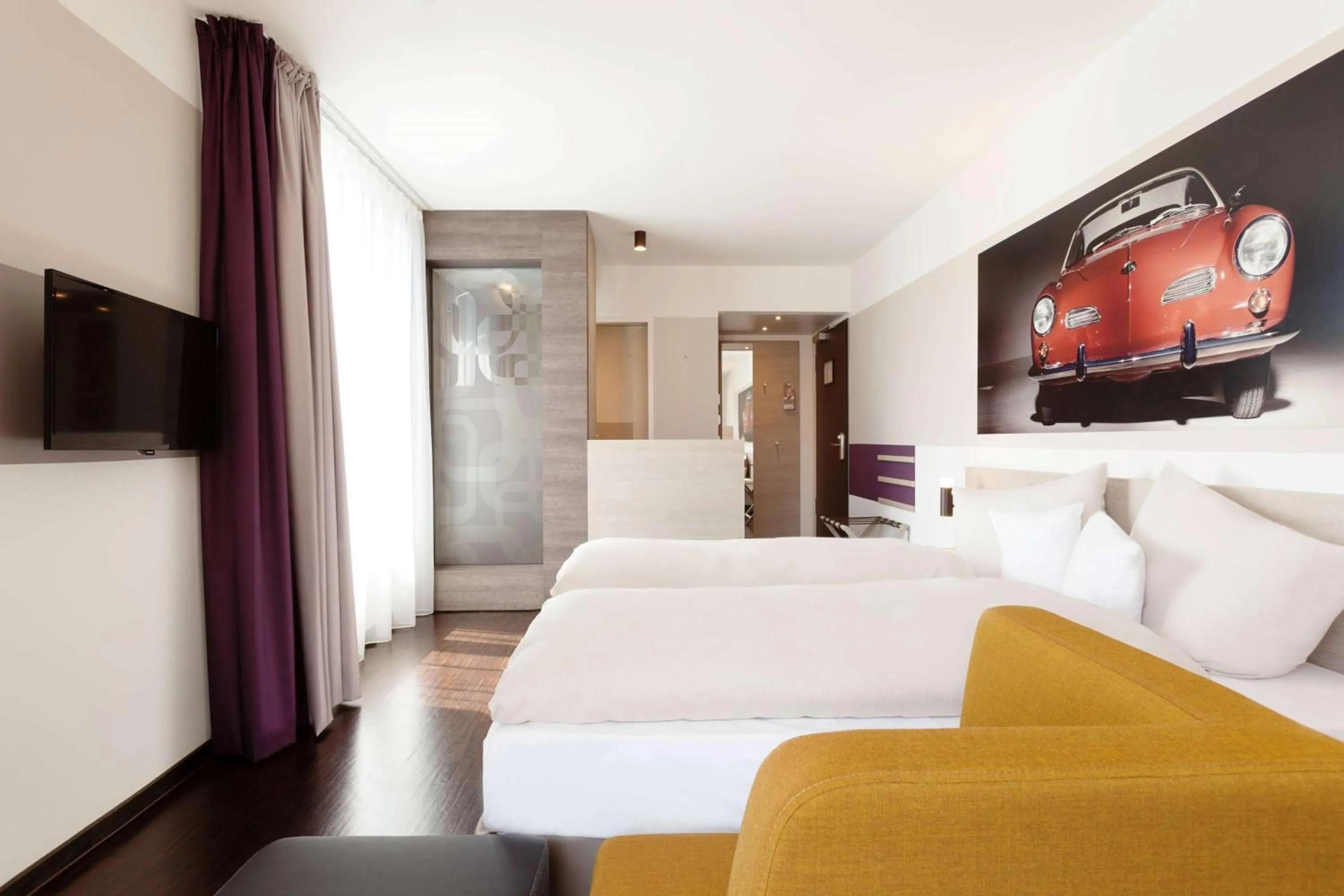 Photo of the whole room, Bed in Vienna House Easy by Wyndham Osnabrück City & Apartments