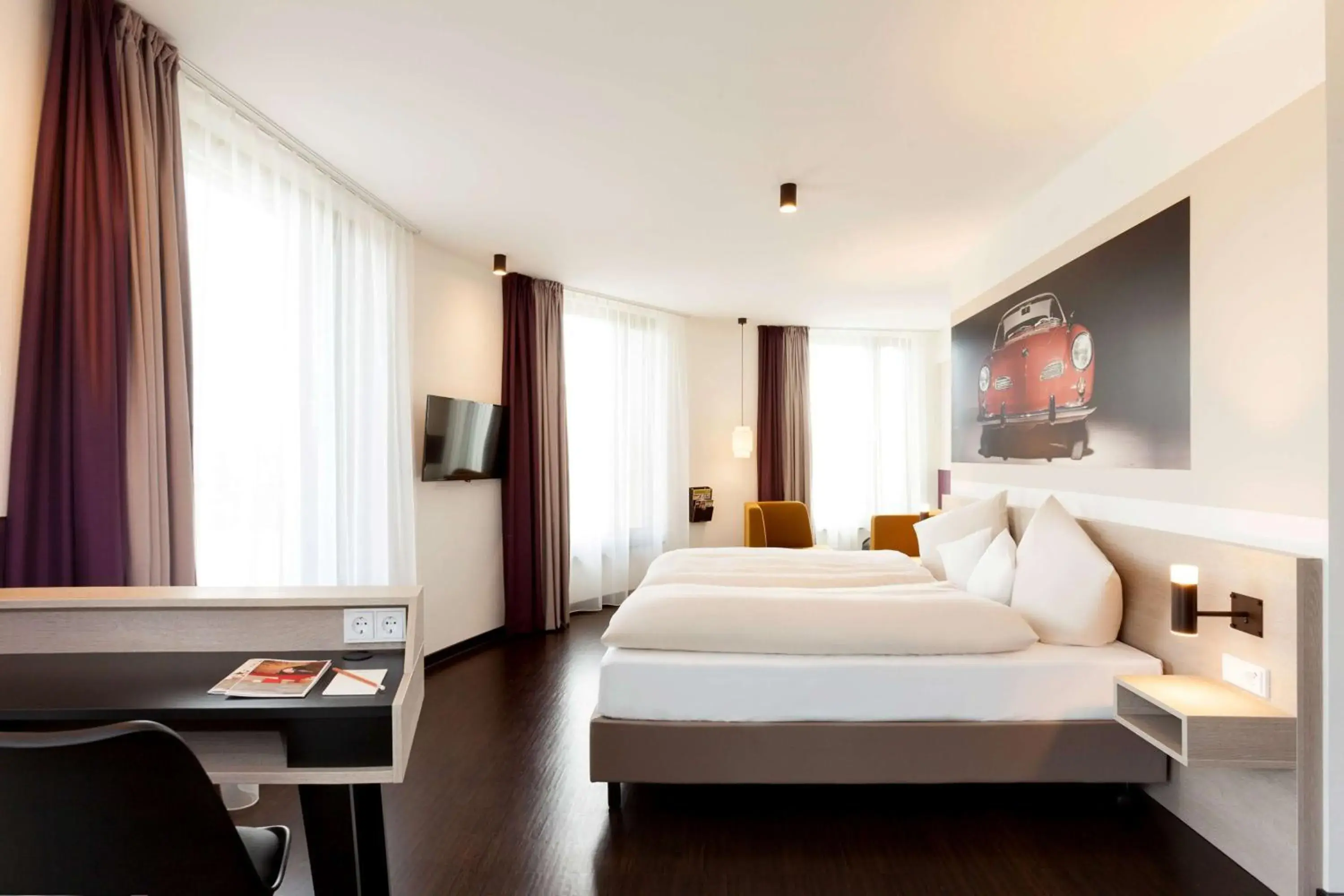 Bed in Vienna House Easy by Wyndham Osnabrück City & Apartments Bed in Vienna House Easy by Wyndham Osnabrück City & Apartments