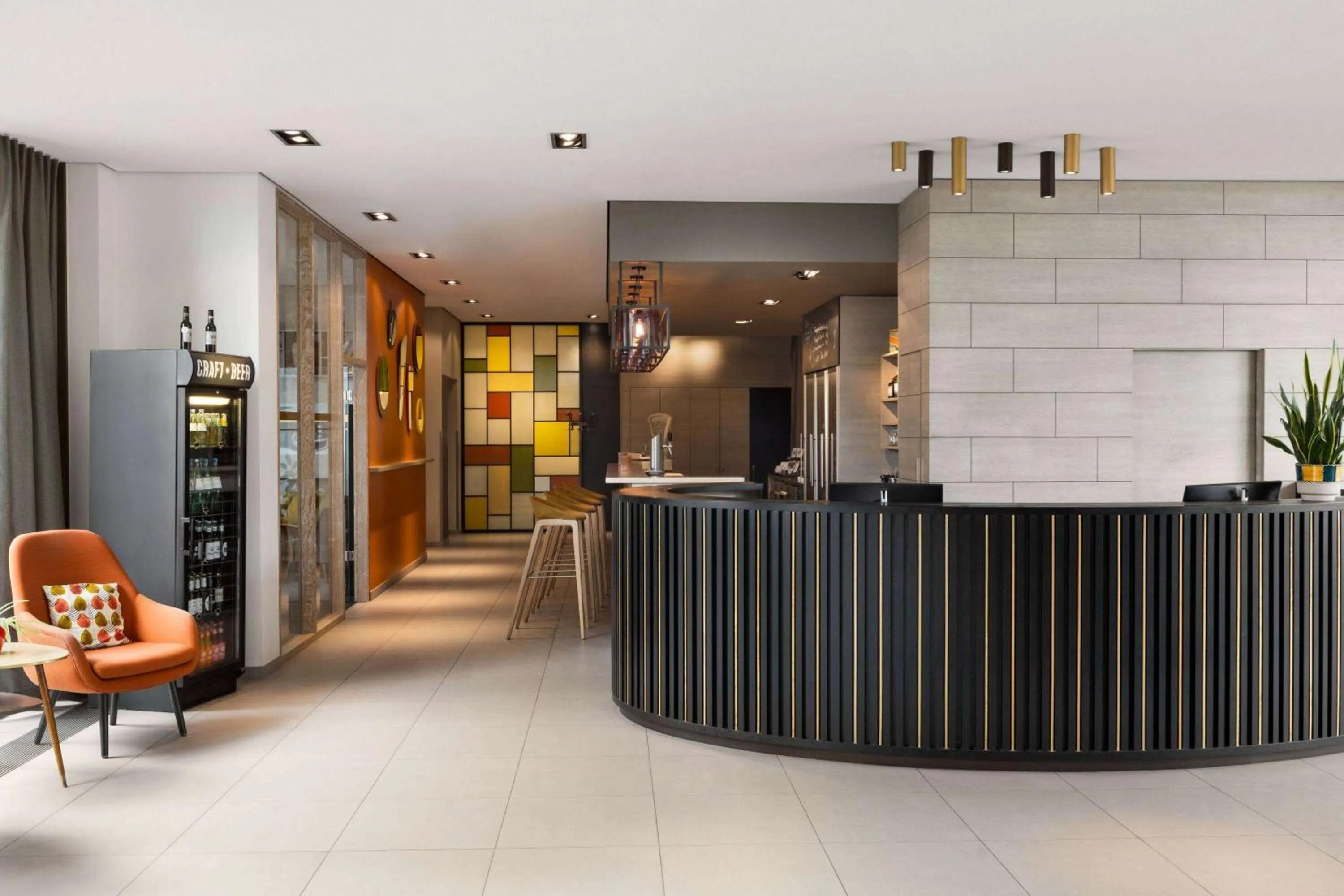 Lobby or reception in Vienna House Easy by Wyndham Osnabrück City & Apartments