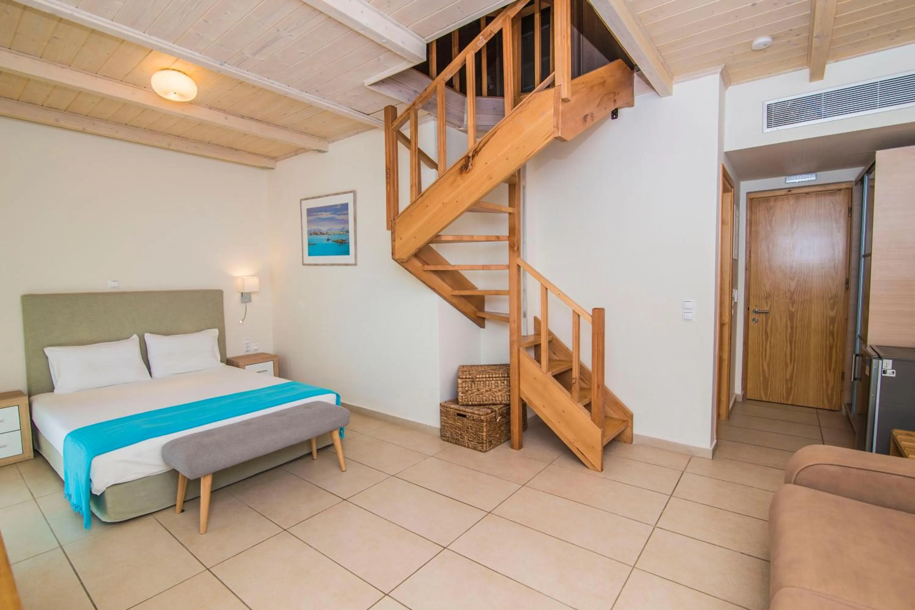 Bed in Grand TheoNi Boutique Hotel & Spa