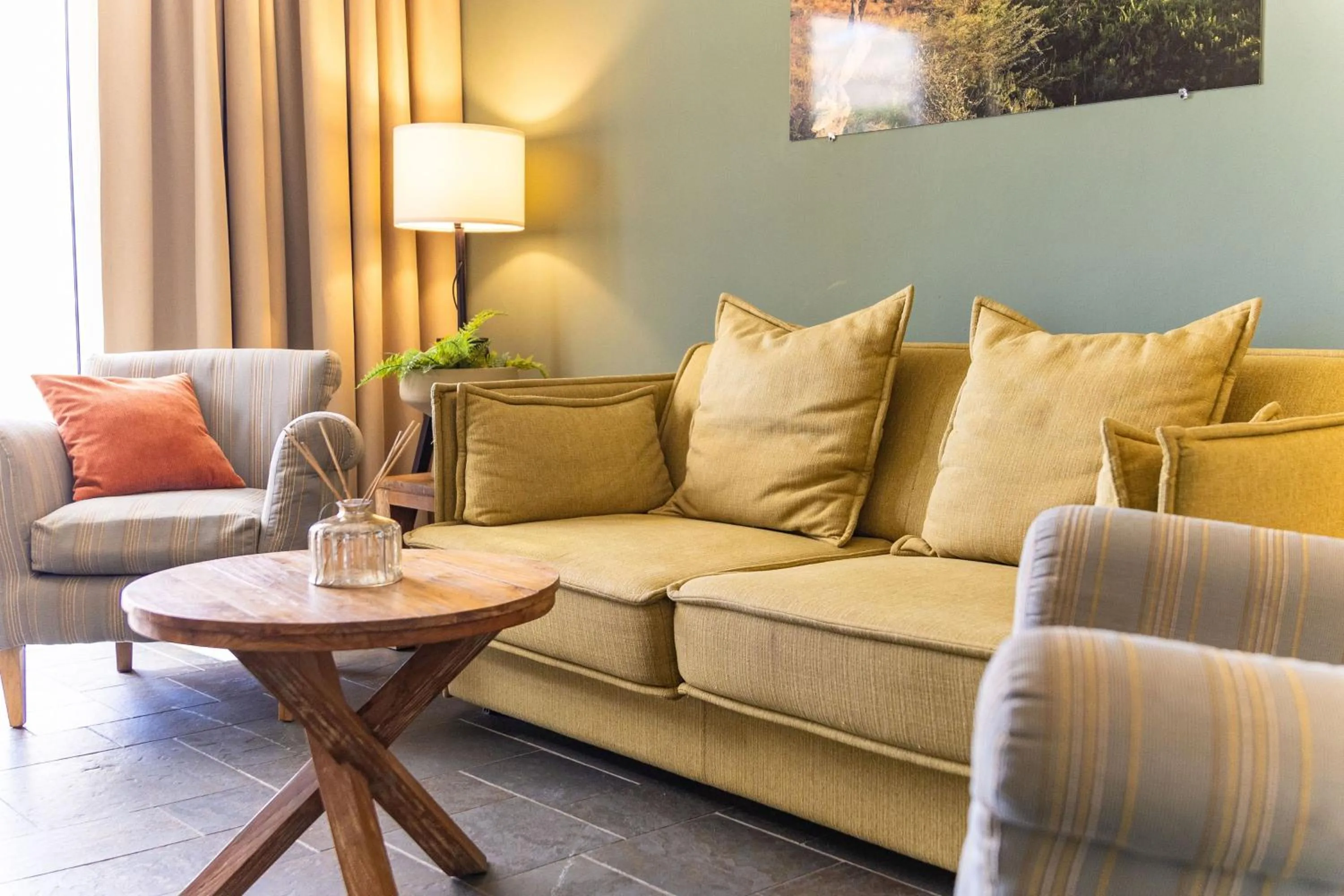 Living room in Bayside Boutique Hotel - Blue Bay Golf & Beach Resort